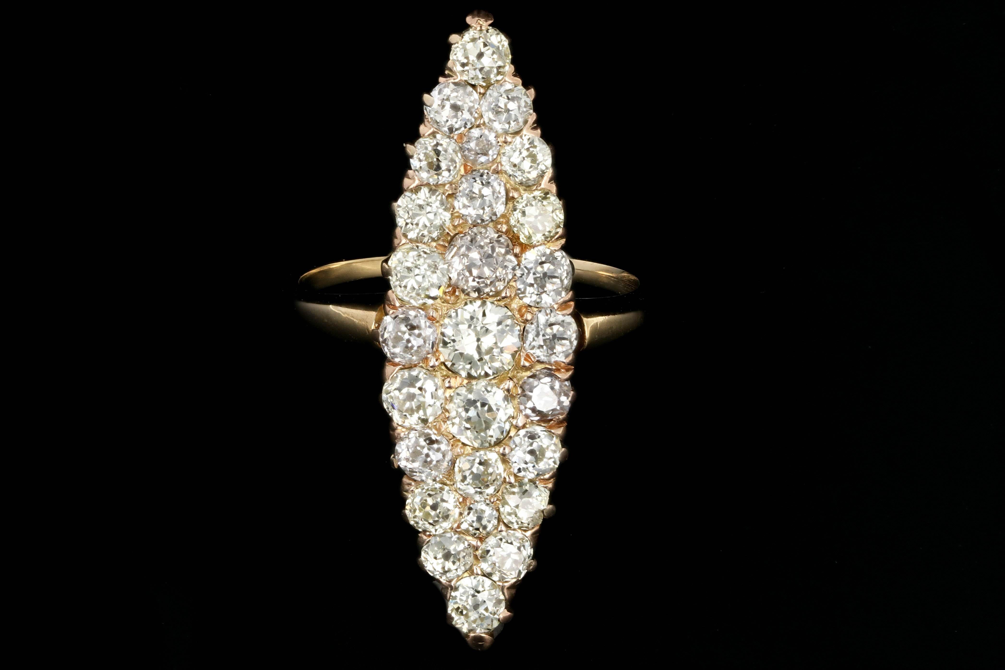 Era: Victorian

Composition: 18K Yellow Gold

Primary Stone: Old Cut Diamonds

Carat Weight: Approximately 4 Carats

Color: J-L

Clarity: Vs2-SI1

Ring Weight:  3.1 DWT

Ring Size: 6.5

Ring Height: 35mm

Ring Width:15mm