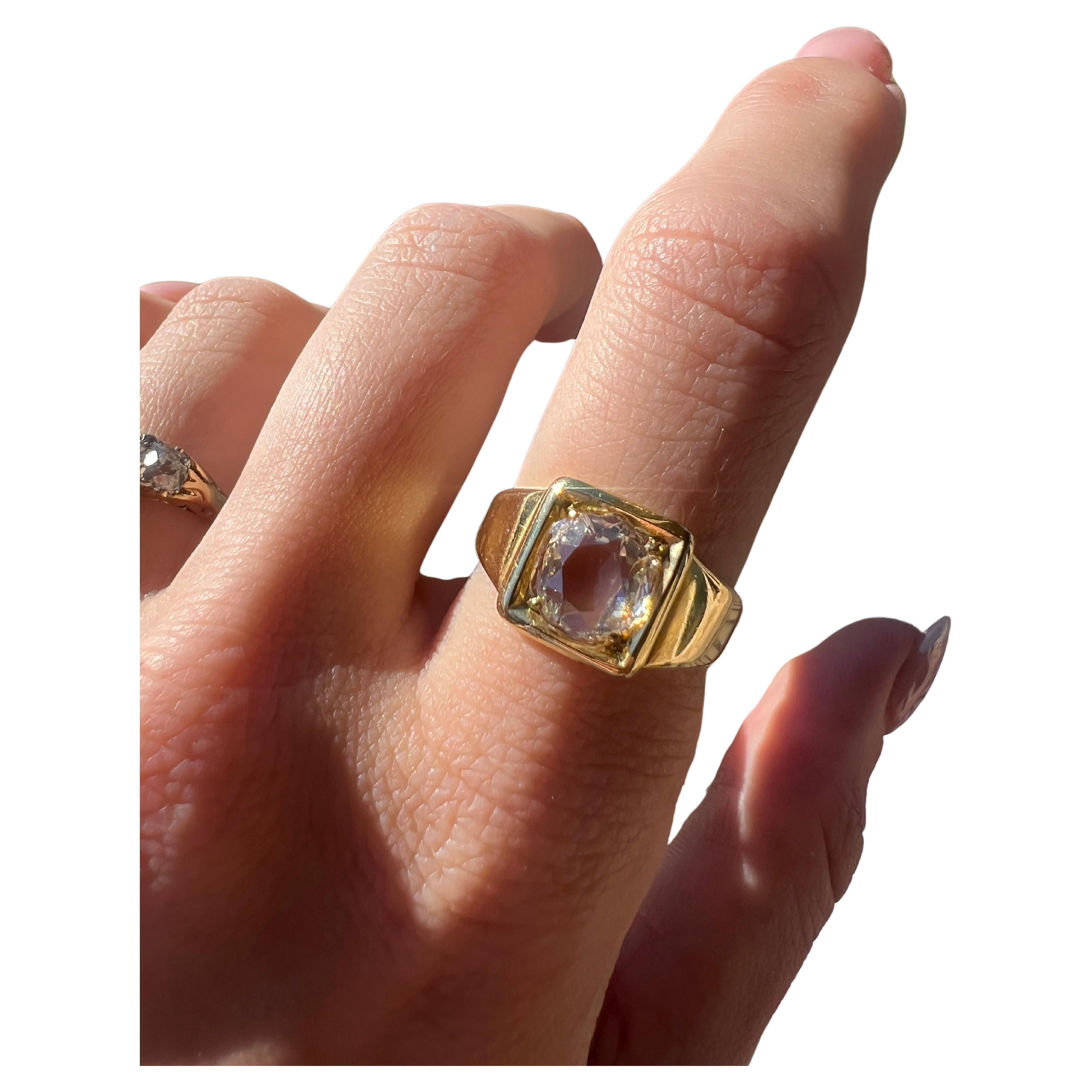 This lovely Victorian 18k yellow gold old mine cut ring is incredibly unique. This beautiful ring features a spready old mine cut diamond set in a thick gold band, hallmarked Birmingham 1872.  The diamond spreads 8.9mm x 7.7mm, and is estimated to