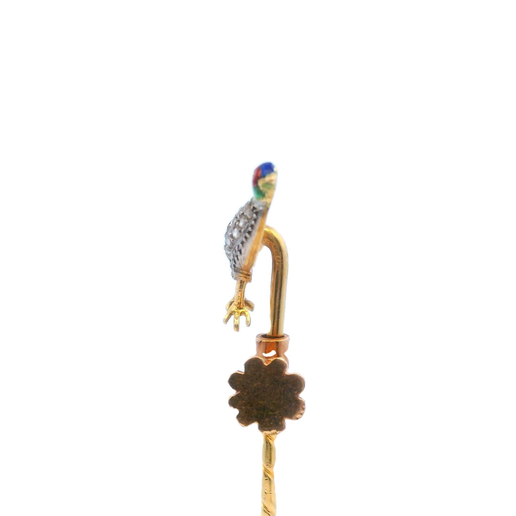 Victorian Whimsical 18K Yellow Gold Rose Cut and Enamel Pheasant Stickpin

Created around 1900, this exquisite Victorian brooch captures the delicate beauty of a bird in motion. The body shimmers with rose-cut diamonds, each carefully set to