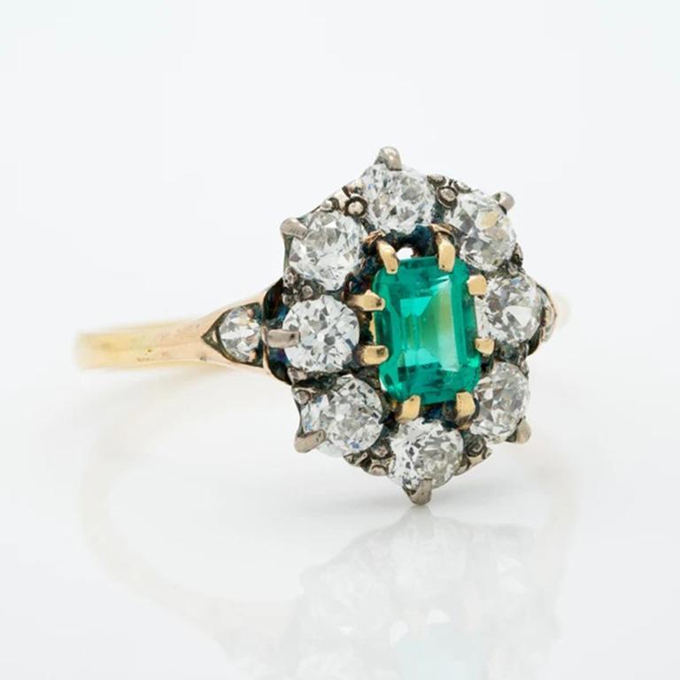 Victorian 18k Yellow Gold Colombian Emerald and Diamond Halo Ring c.1850. 

The very picture of opulence unrestrained, the halo ring has been a prized piece of jewelry throughout the most thriving periods of the past two-hundred years. Having first