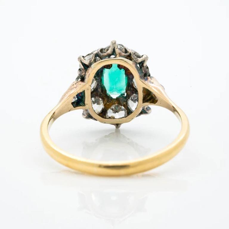 Old European Cut Victorian 18K Gold and Silver and 1.0 Carat Emerald and 1.50 Carat Diamond Halo
