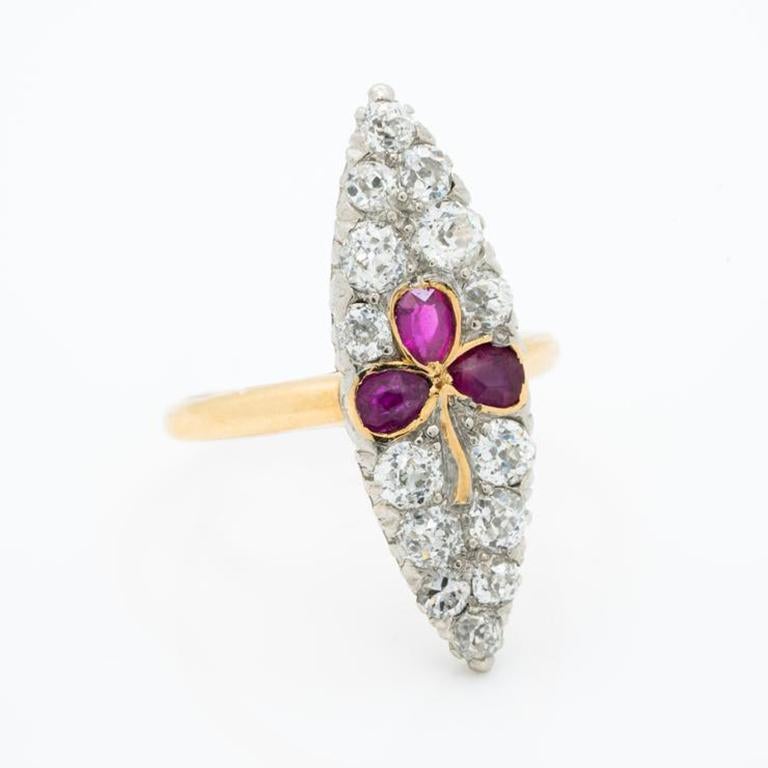 Victorian 18K Yellow Gold, Silver And 1.15Cts. Old European Cut Diamonds And Natural Rubies Trefoil Navette Ring C.1880S

Additional Information:
Period: Victorian
Year: c.1880s
Material: 18k Yellow Gold, Silver, 1.15cts. Old European Cut Diamonds