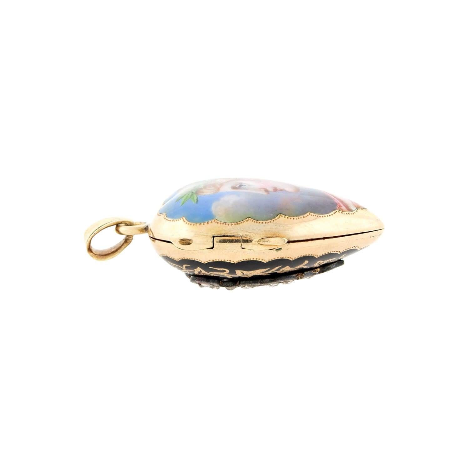 Uno splendido medaglione in oro e smalto di epoca vittoriana (ca. 1880)! Questo meraviglioso pezzo è realizzato in oro giallo 18kt e presenta un ritratto di grande impatto visivo. Il ritratto è dipinto a mano e ricoperto da uno strato di smalto