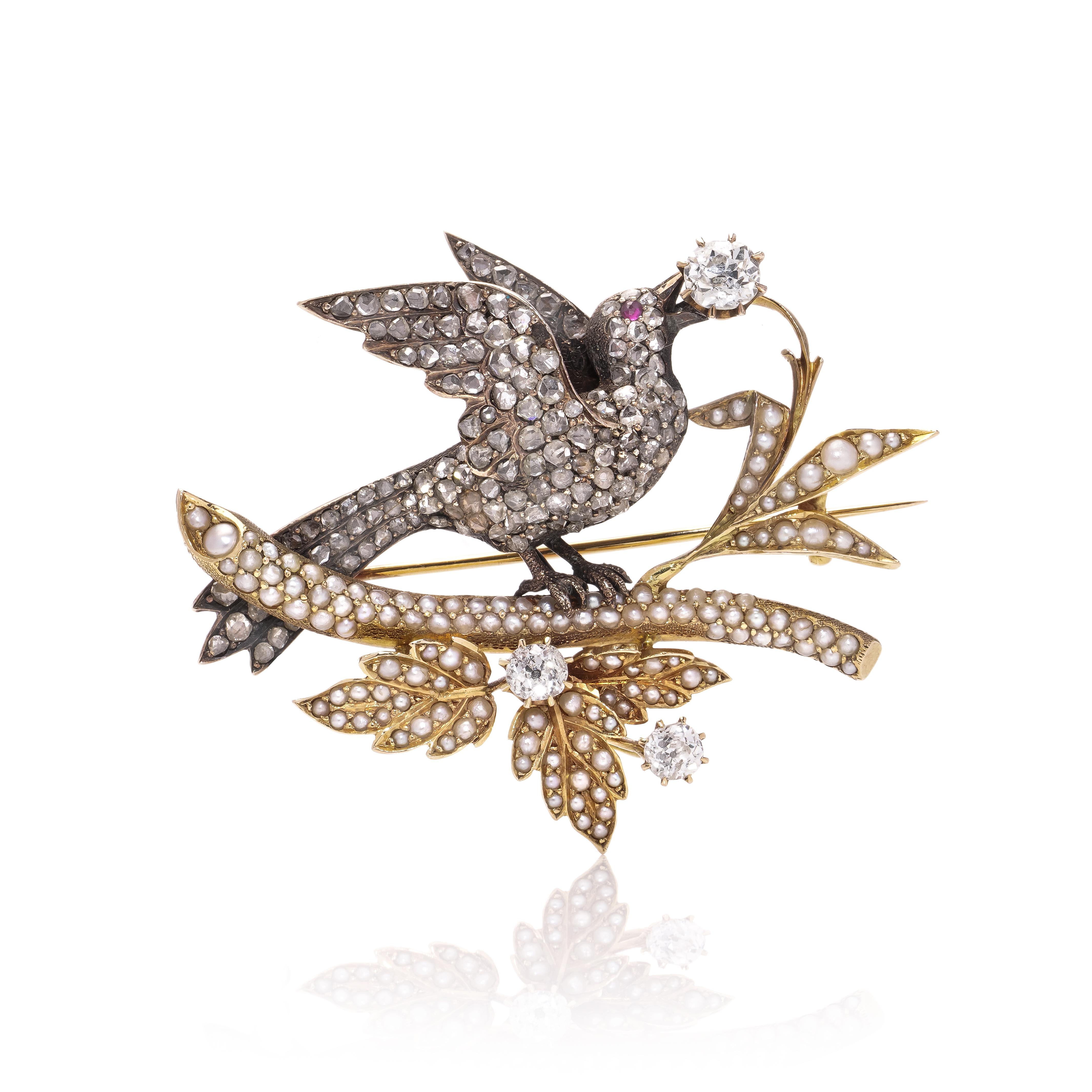 Rose Cut Victorian 18kt gold and silver bird standing on a branch brooch with diamonds  For Sale