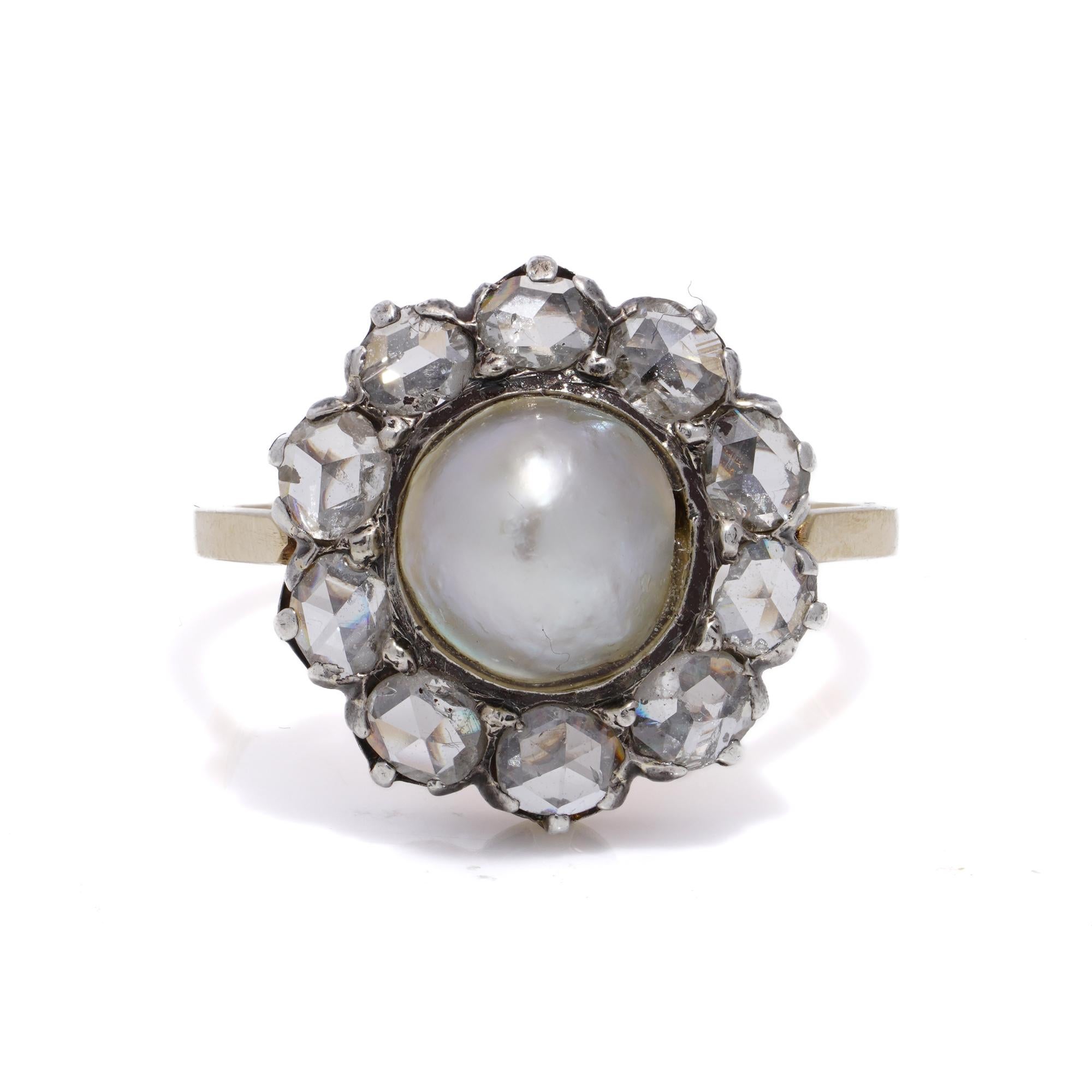 Antique Victorian 18kt yellow gold and silver flower head pearl and diamond cluster ring. 
Made in England, circa 1890s 
X-ray tested positive for 18kt gold and silver. 
Please note: Shank has been added later. 

Dimensions - 
Finger Size (UK) = M (