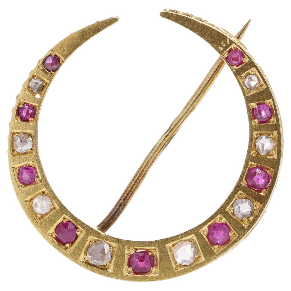 Victorian 18kt gold diamond and ruby crescent brooch  For Sale