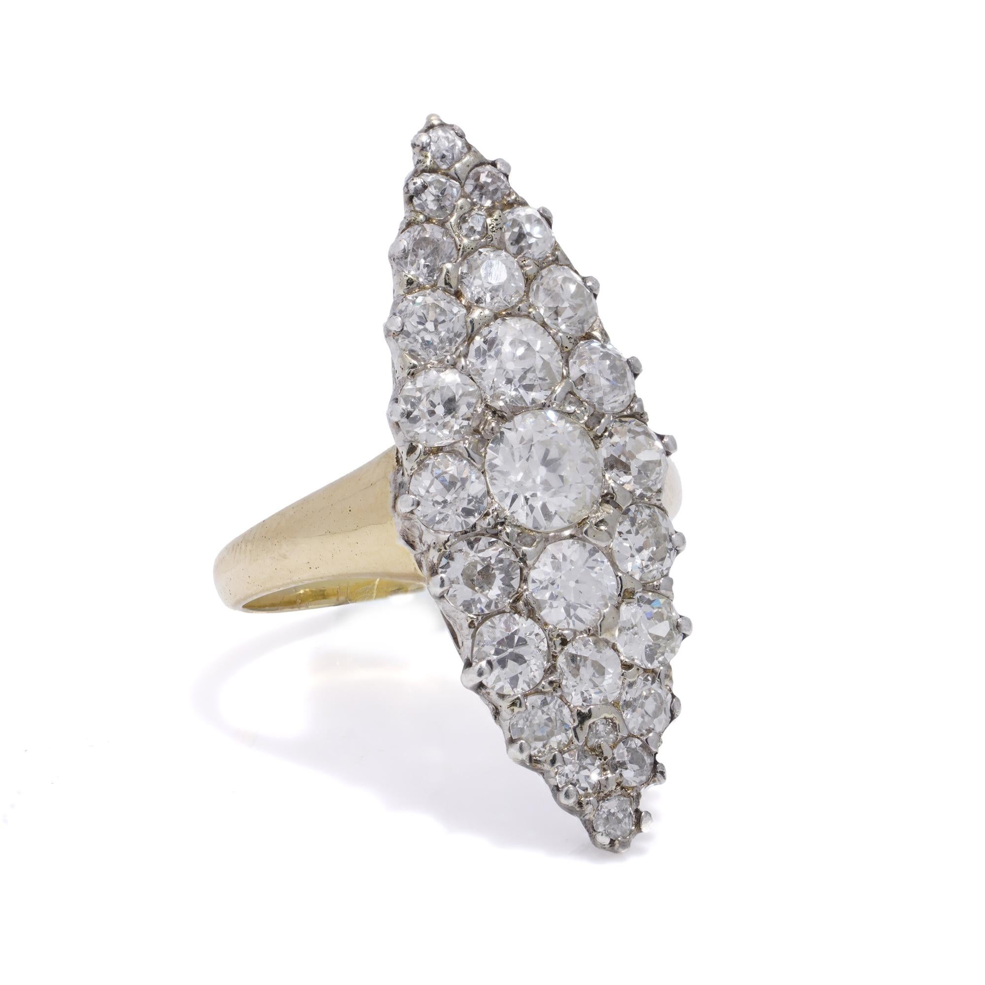 Presenting an antique Victorian marquise-shaped cluster ring crafted in 18kt yellow gold and silver, featuring stunning Old-European cut diamonds.
Made in England, circa 1890s
Hallmarked for 18kt gold.

Dimensions -
Finger Size (UK) = N ( EU) = 55