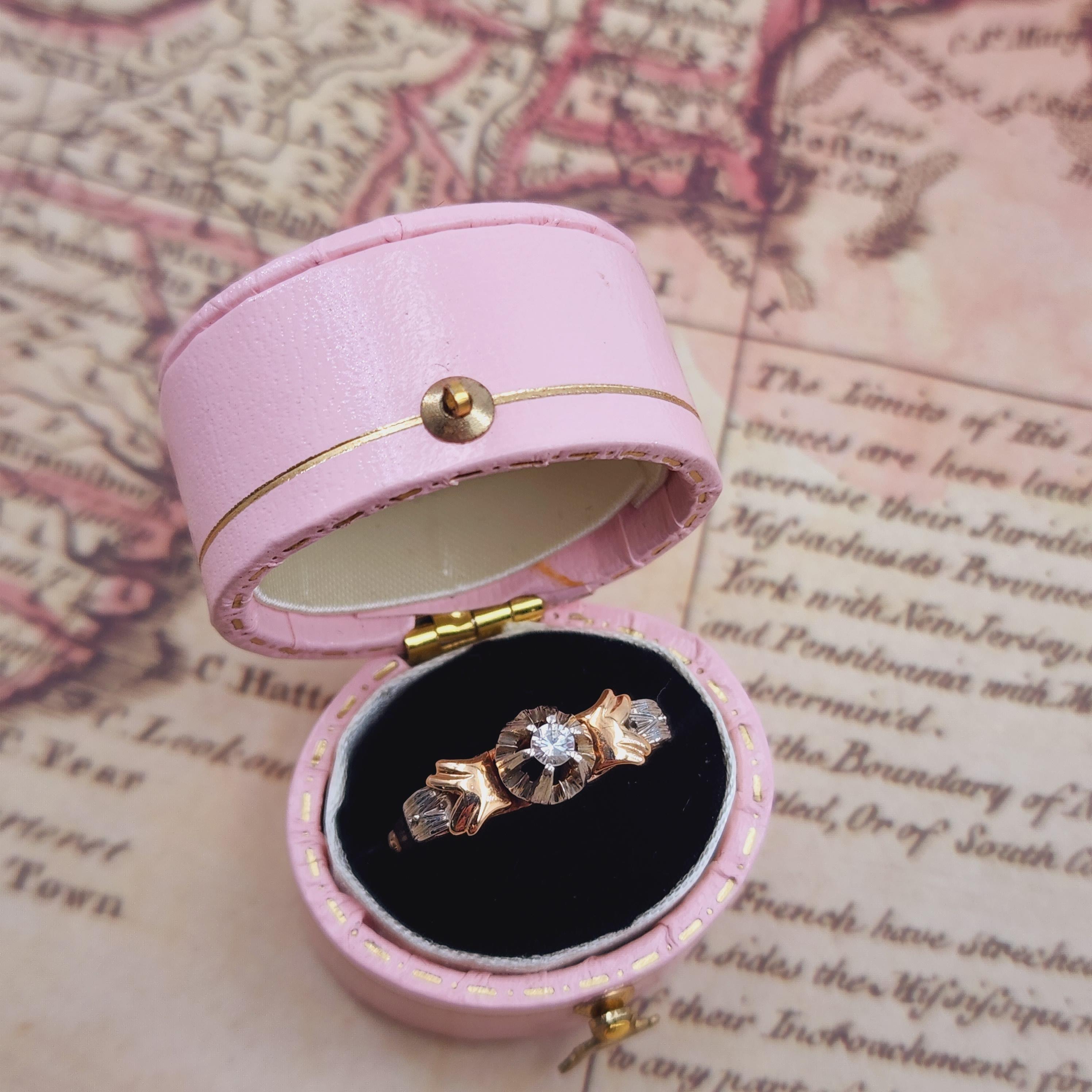 This late Victorian-era ring is a stunning blend of elegance and craftsmanship, expertly crafted in 18kt yellow and white gold. At the center of this beautiful piece lies a full cut diamond, approximately 0.30 carats, graded H in color and SI2 in