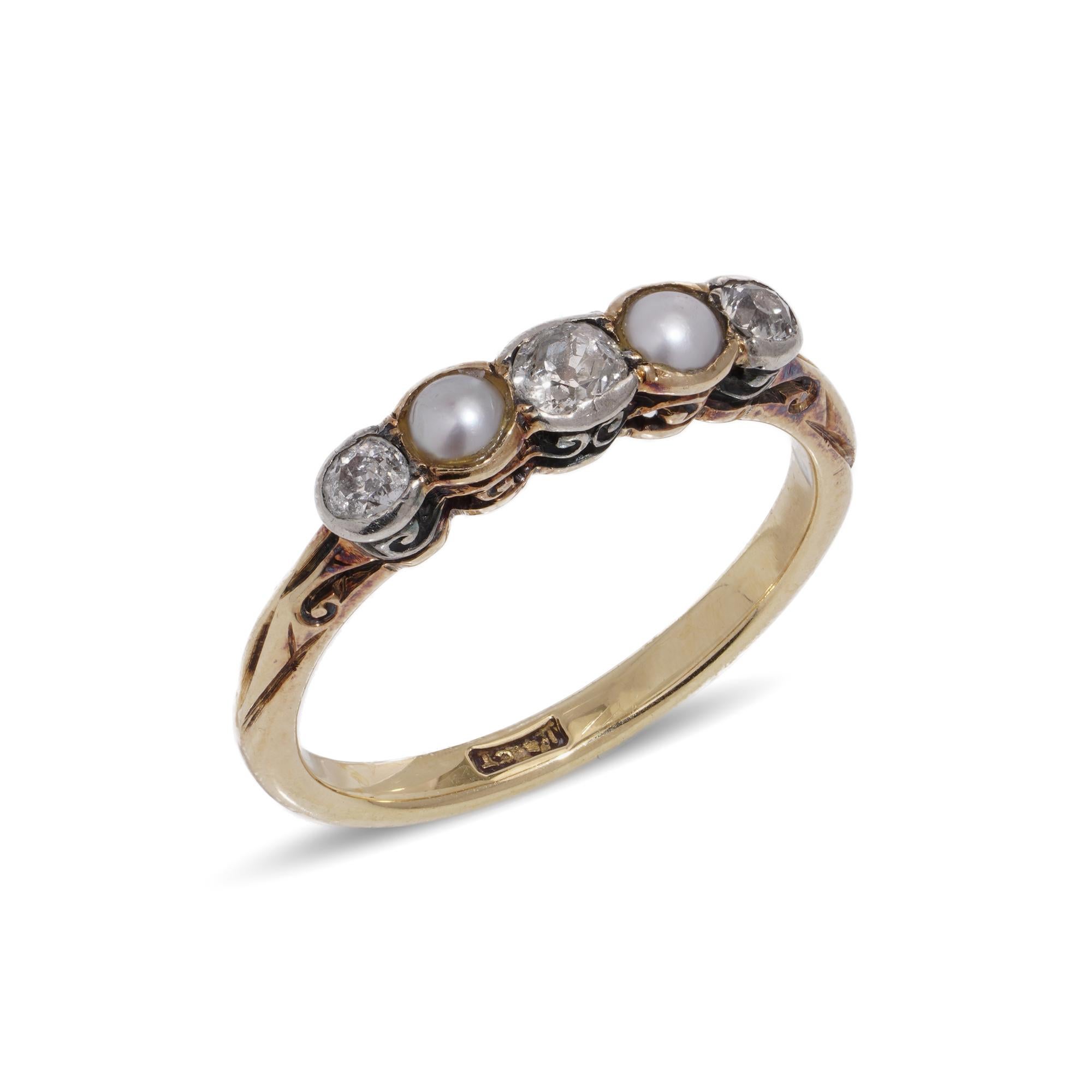 Antique Victorian 18kt. yellow gold and silver ladies five stone ring set with three old European - cut diamonds and natural pearls.
Made in England, circa 1890's
Hallmarked for 18kt gold., tested positive for silver.

Dimensions -
Finger Size (UK)