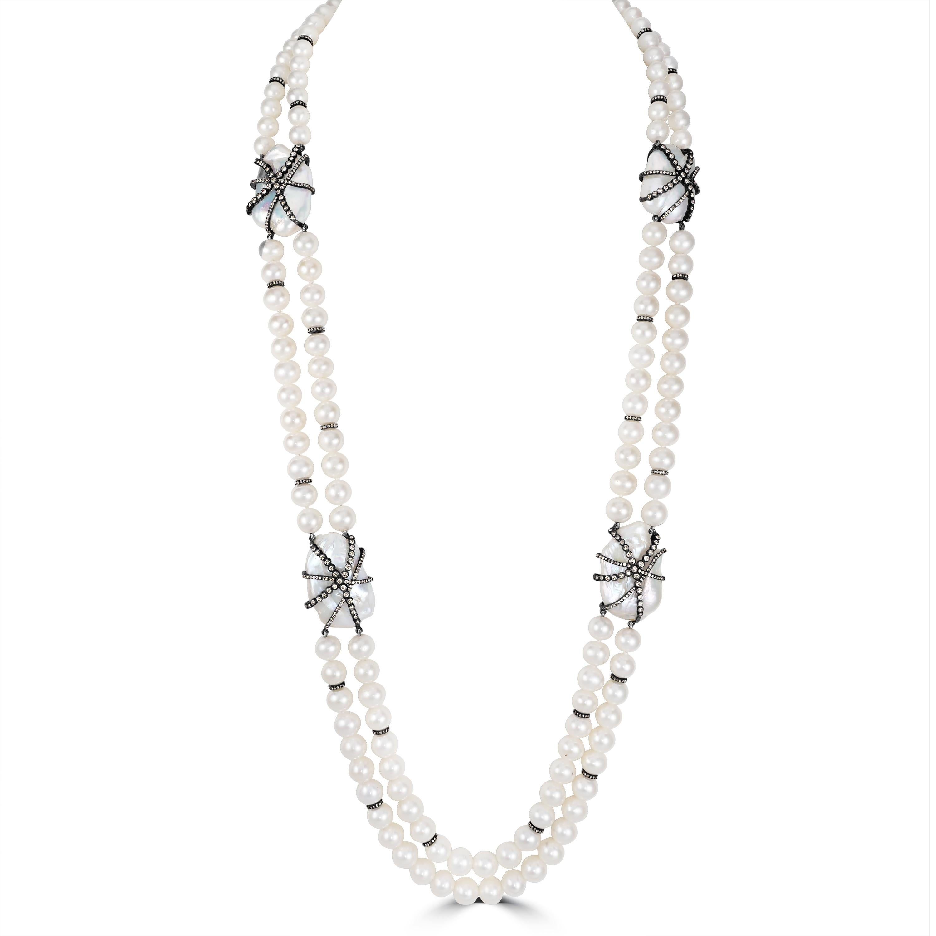 Indulge in timeless elegance with our Victorian Pearl and Diamond Beaded Necklace, a luxurious statement piece that exudes sophistication and grace.

Crafted with meticulous attention to detail, this exquisite necklace features a 36-inch strand of
