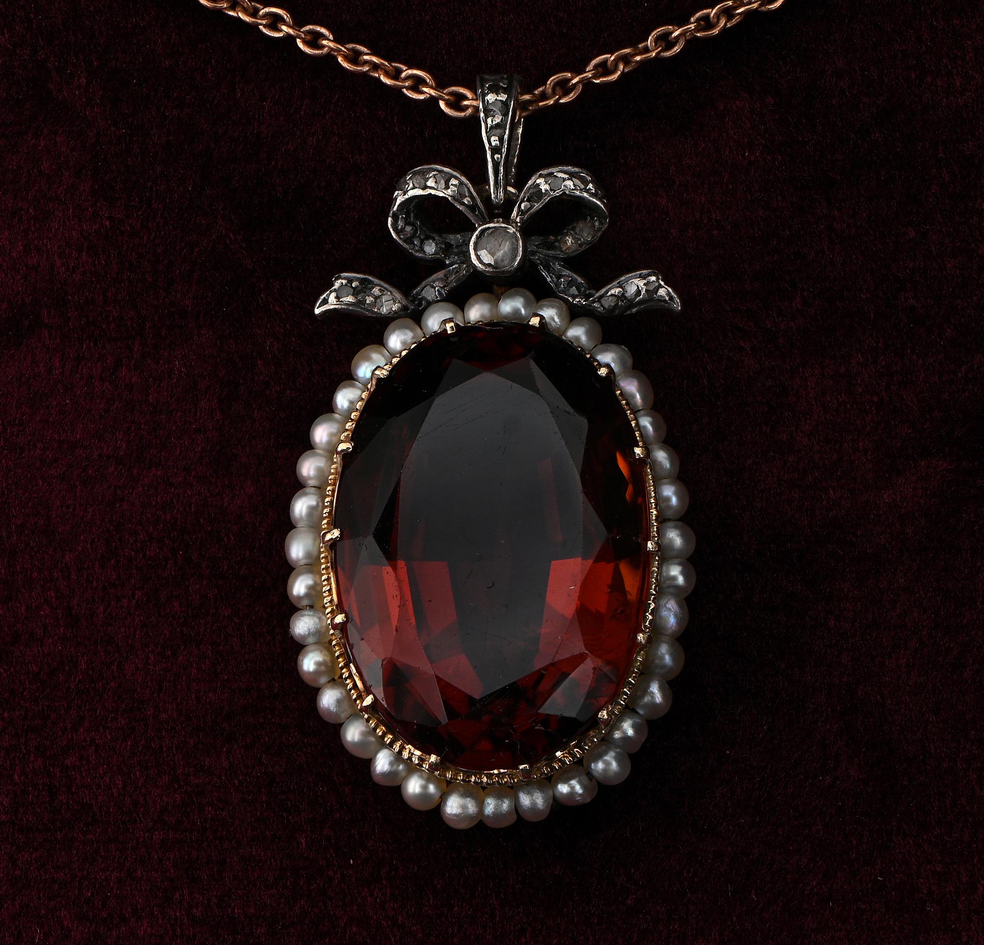 Rare Find
This authentic Victorian period pendant is 1880 ca.
Very pretty and distinctive from the period designed with a gorgeous bow topping the oval shape main pendant of fine gems selection and glorious crafting, 18 KT solid gold/ silver