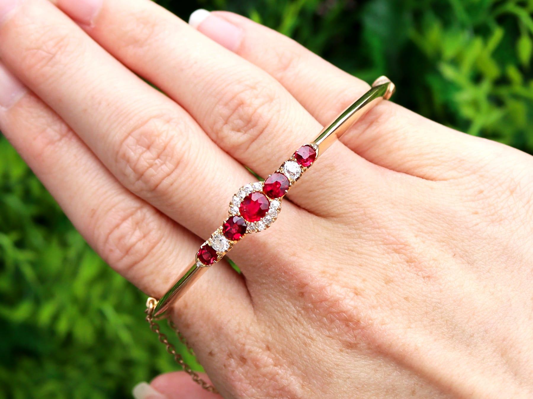 A stunning, fine and impressive antique 1.95 carat ruby and 0.40 carat diamond, 15 karat yellow gold bangle; part of our diverse antique ruby jewellery collections.

This stunning antique bangle has been crafted in 15k yellow gold.

The pierced