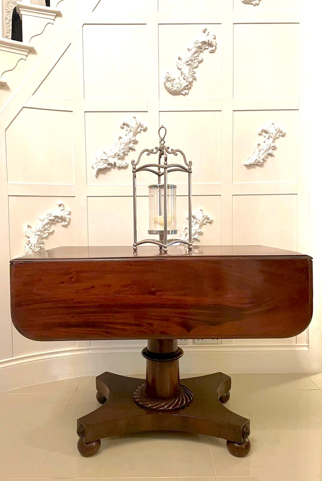 Victorian 19th century antique Victorian mahogany pedestal centre table having a quality mahogany top with two drop leaves, one drawer to the frieze and raised on a lovely turned shaped column. It stands on a platform base with the original turned