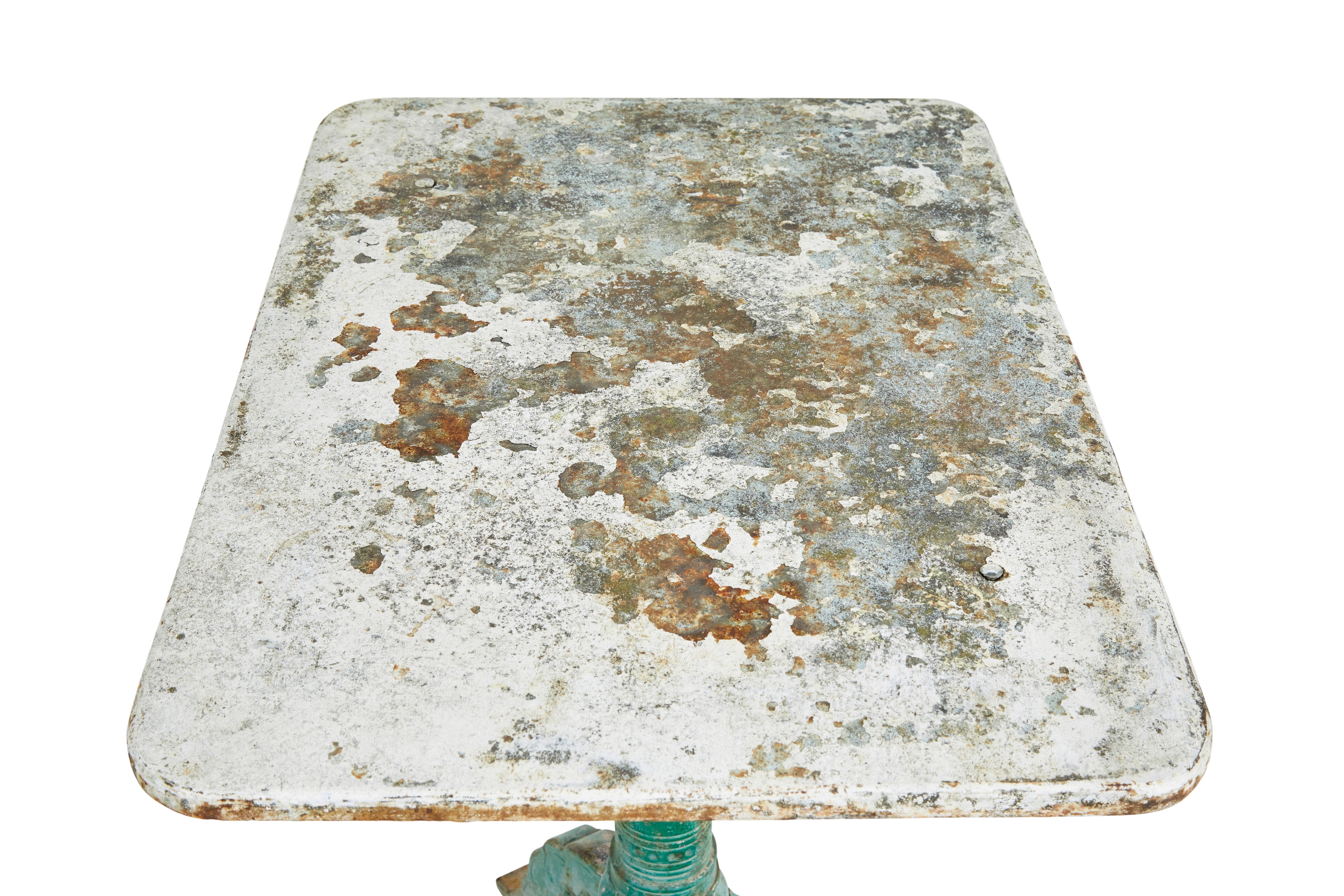 Victorian 19th century cast iron occasional table circa 1870.

Fine quality in original condition with original paint, which really echoes the victorian golden industrial era. Stunning architectural stem with tripod base. Obvious signs of wear and