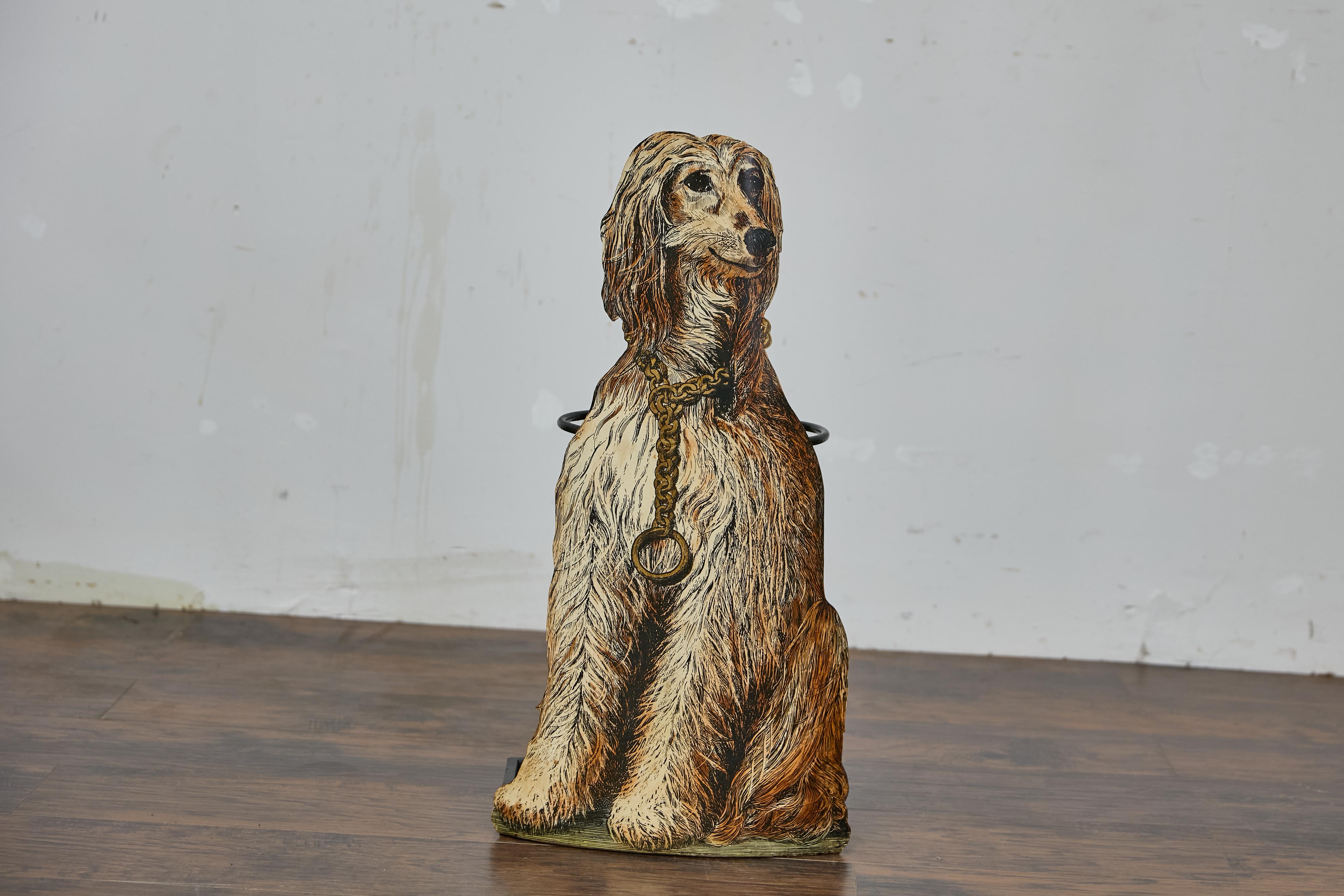 An English Victorian painted cast iron umbrella stand depicting a sitting dog. This charming English 19th-century umbrella stand combines functionality with character, making it an ideal piece for welcoming guests in style. Shaped like a dignified