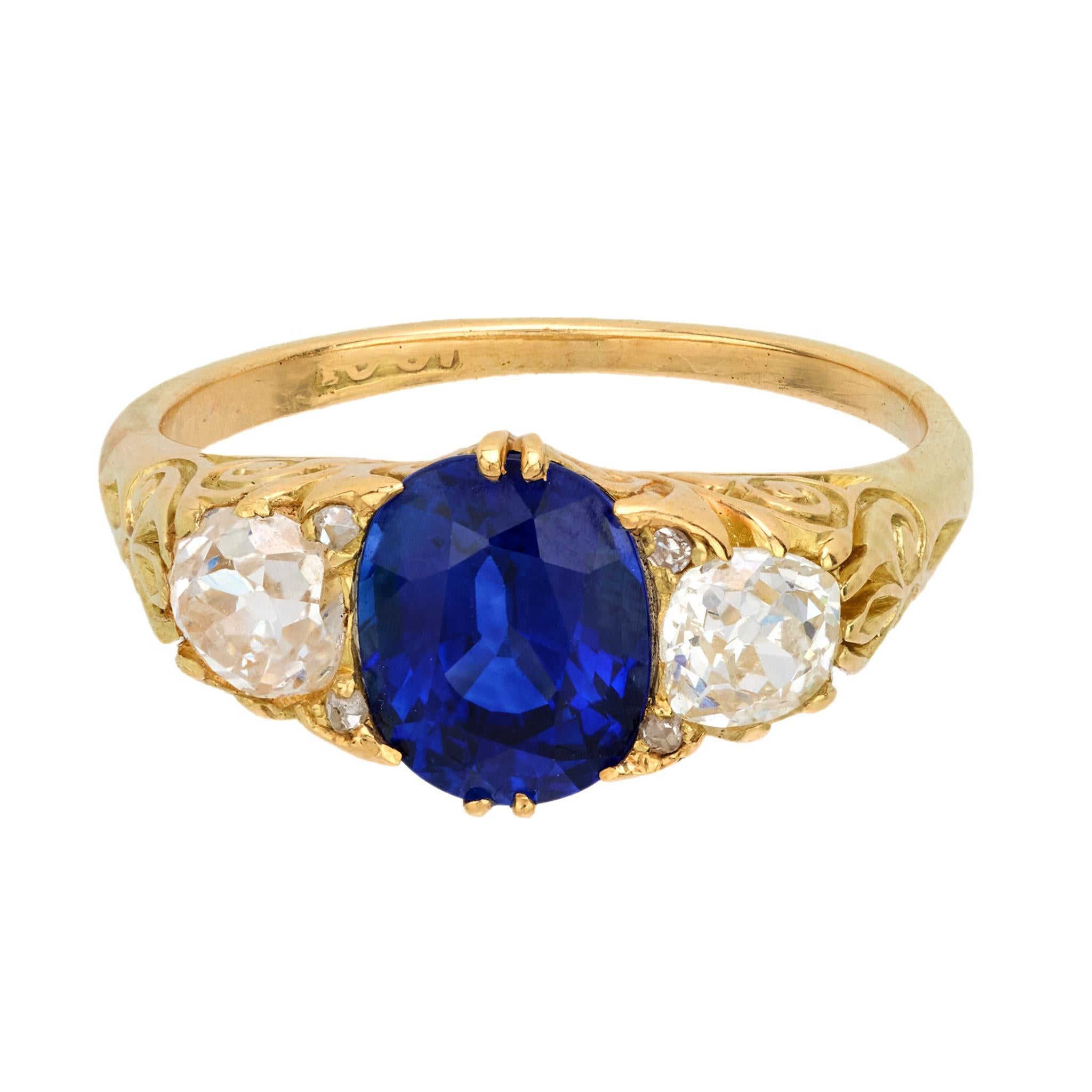 Oval Cut Victorian 2 carat sapphire old mine cut diamond 18k yellow gold three stone ring For Sale