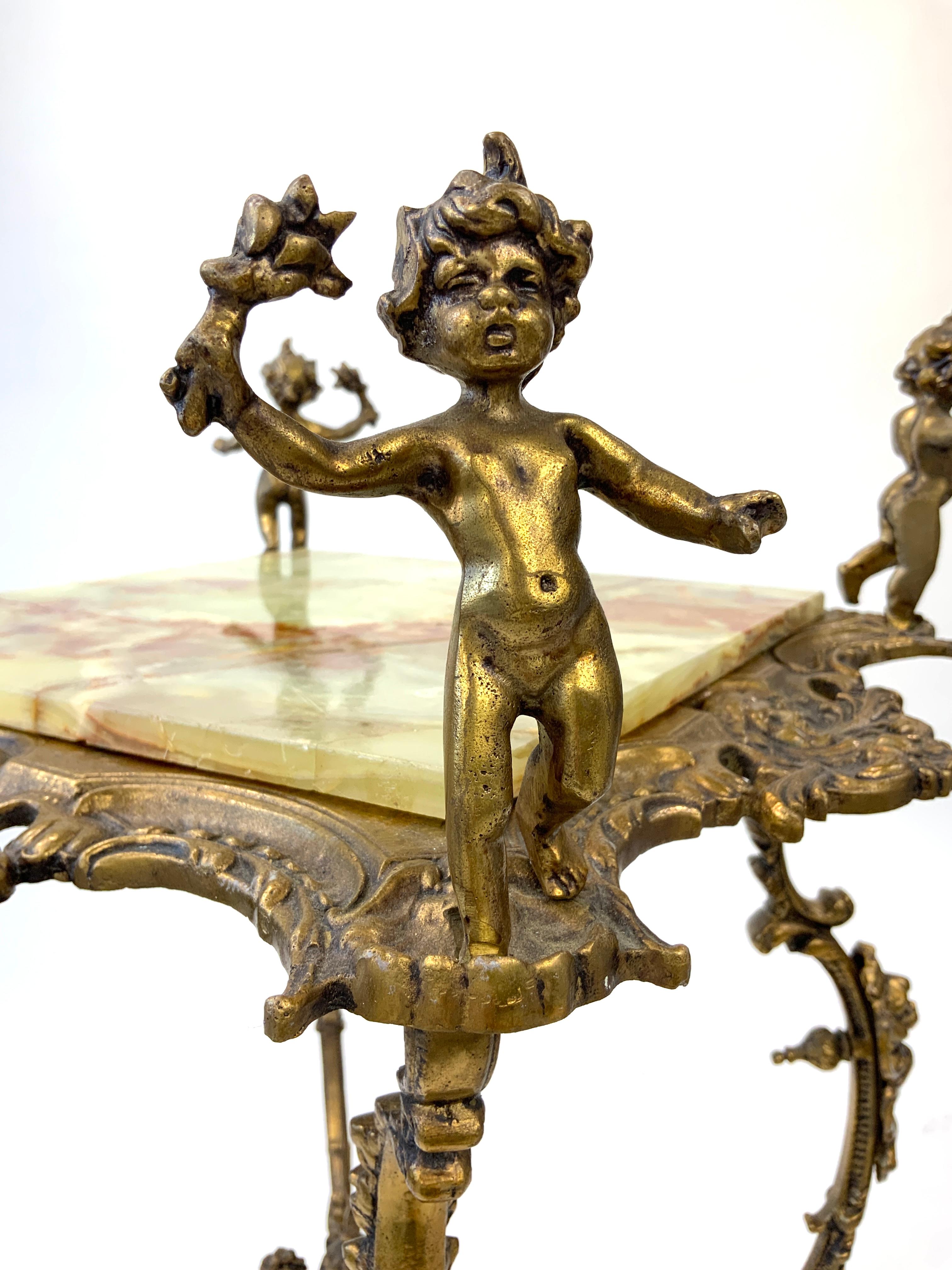 Cast Victorian 2-Tier Brass and Onyx Plant Stand with Figural Putti For Sale