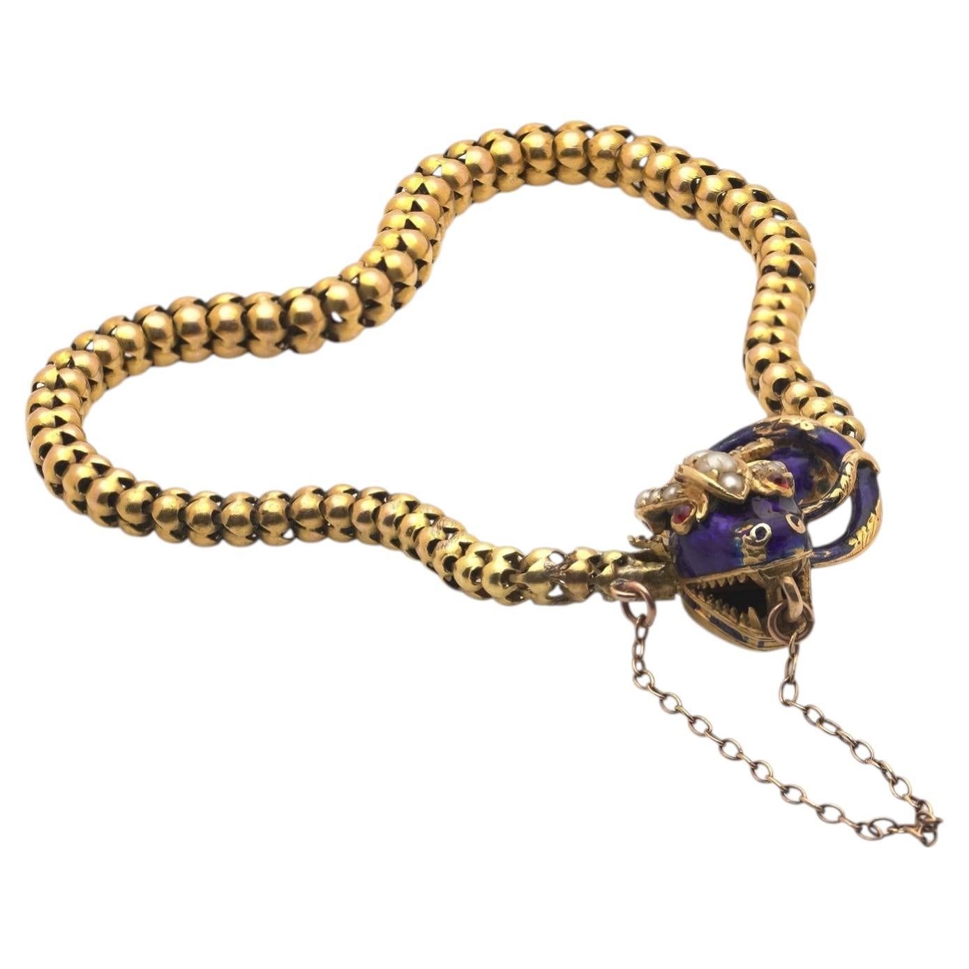 Bracciale vittoriano a forma di serpente in oro 20KT con perle, occhi di rubino e smalto blu