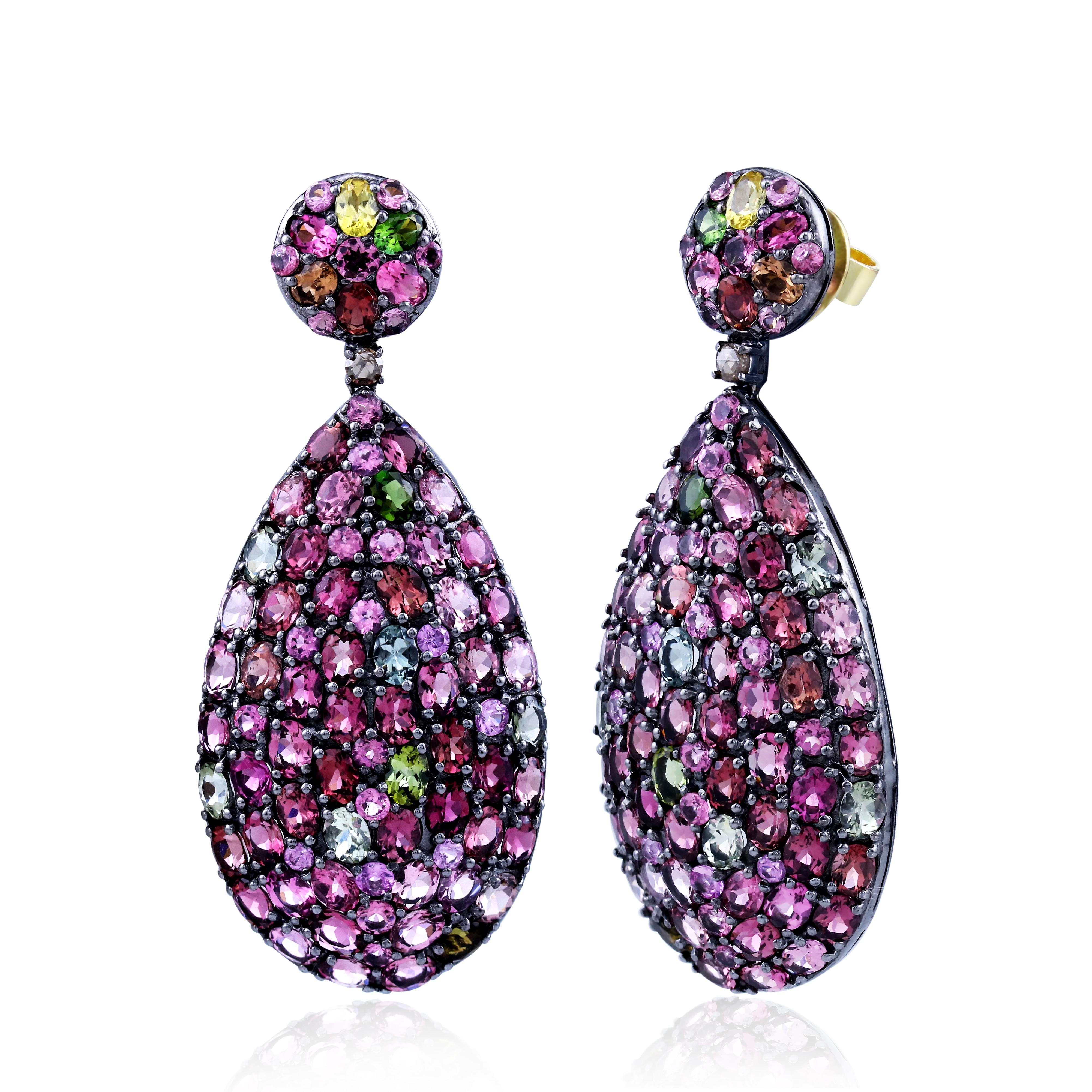 Introducing Gemistry, Victorian 21. 7 Ct. t.w. Pink Tourmaline and Diamond Pear Drop Earrings mounted over 18k White gold and black Rhodium Silver ! These drops are a feast of bright color, scintillating enough to brighten any occasion. Post and