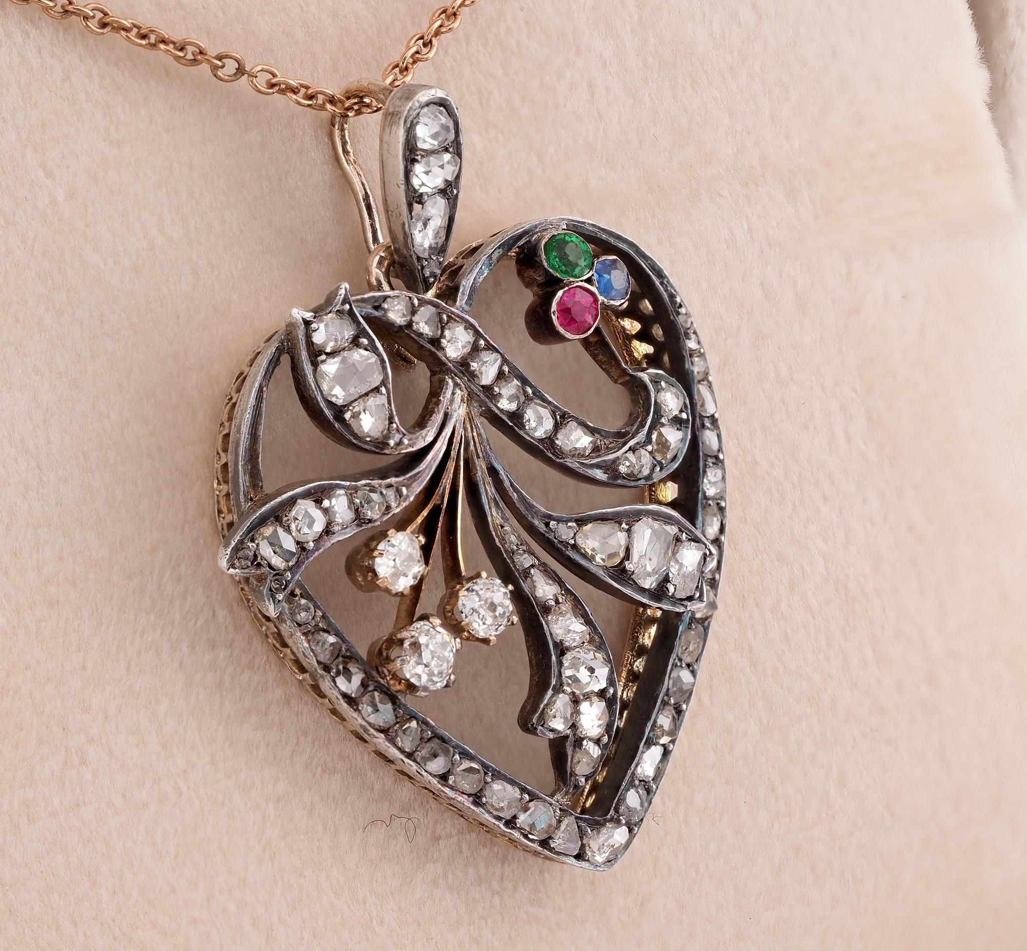 Love Token
This beautiful large sized Victorian Diamond heart pendant is 1870 ca
Hand crafted of solid 18 KT in an amazing openwork expression, fully highlighted by 58 in number Diamonds with a group of coloured paste stones set in a shamrock