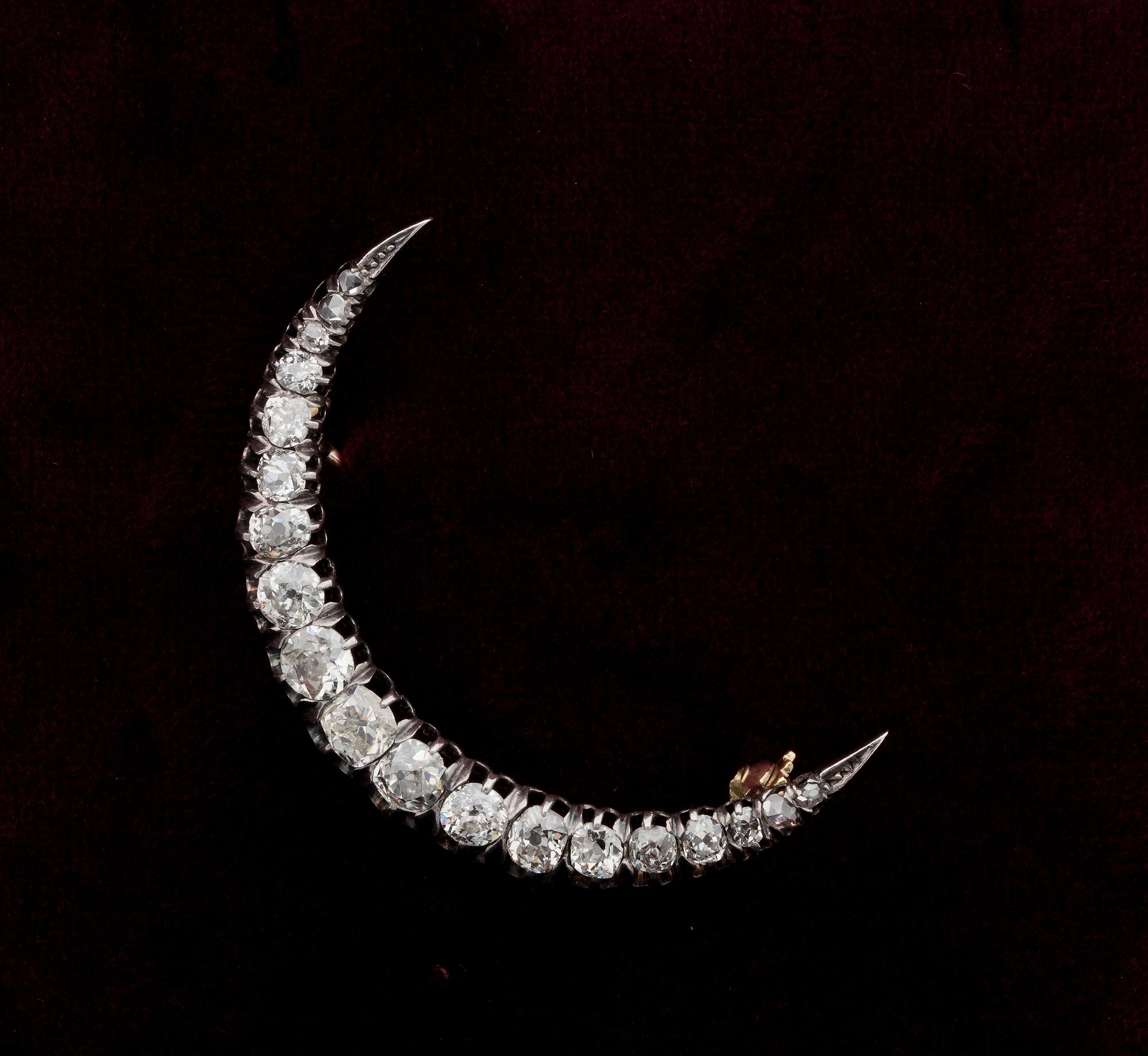 Celestial!

Victorian era Crescent Moon brooch of rare beauty is adorned by an array of graduated in sizes old mine cushion Cut Diamonds and rose cut as finials
It holds approx 2.20 Ct of TCW Diamonds rated G/H/I VVS/SI
The Moon is hand crafted of