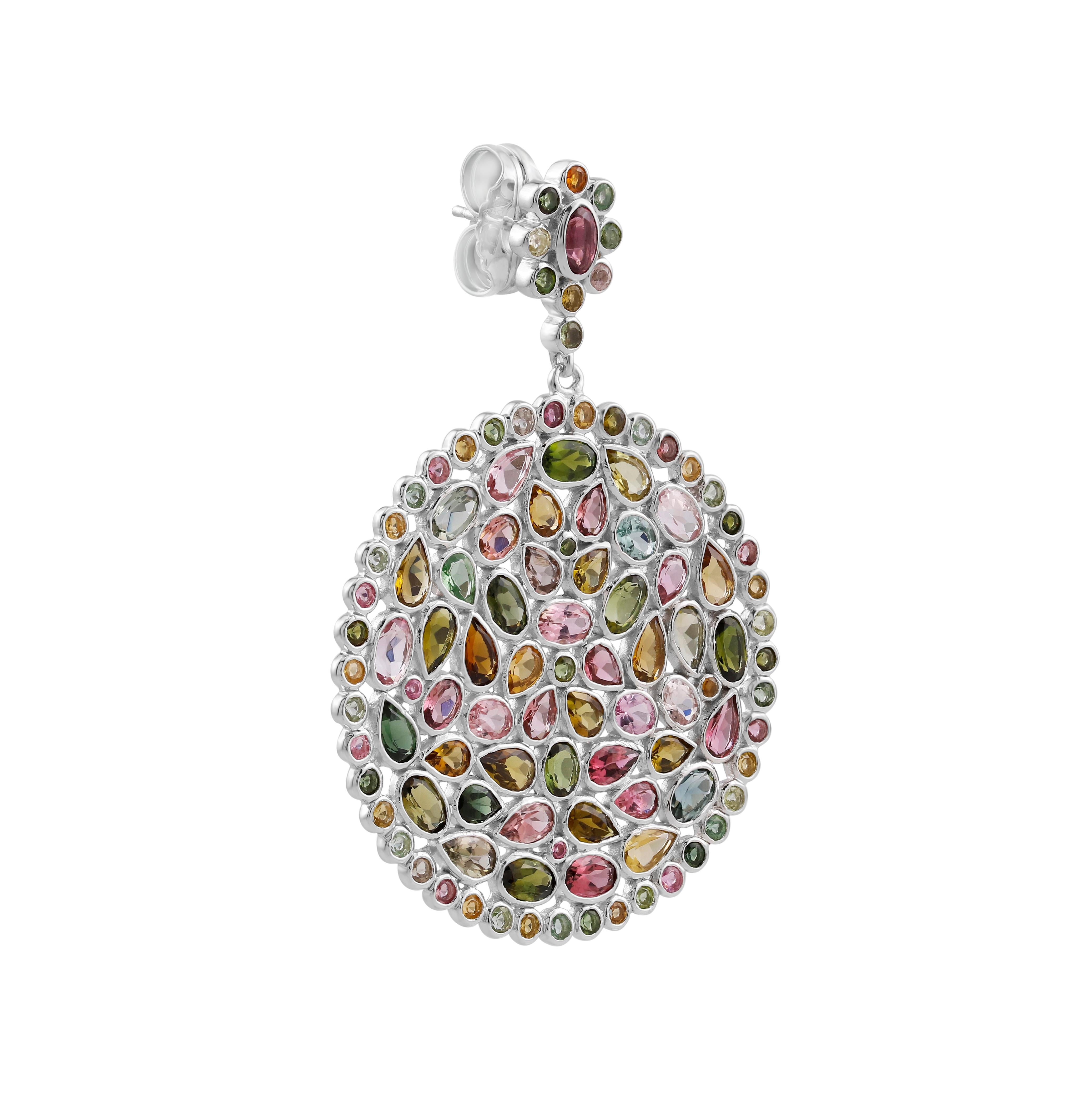 Display double the dazzle with this rainbow-like pair handcrafted in sterling silver. You'll definitely love the colors of the sparkling multi-tourmalines dangling from lovely floral tops. Pop in this pair and add some colorful flair to your