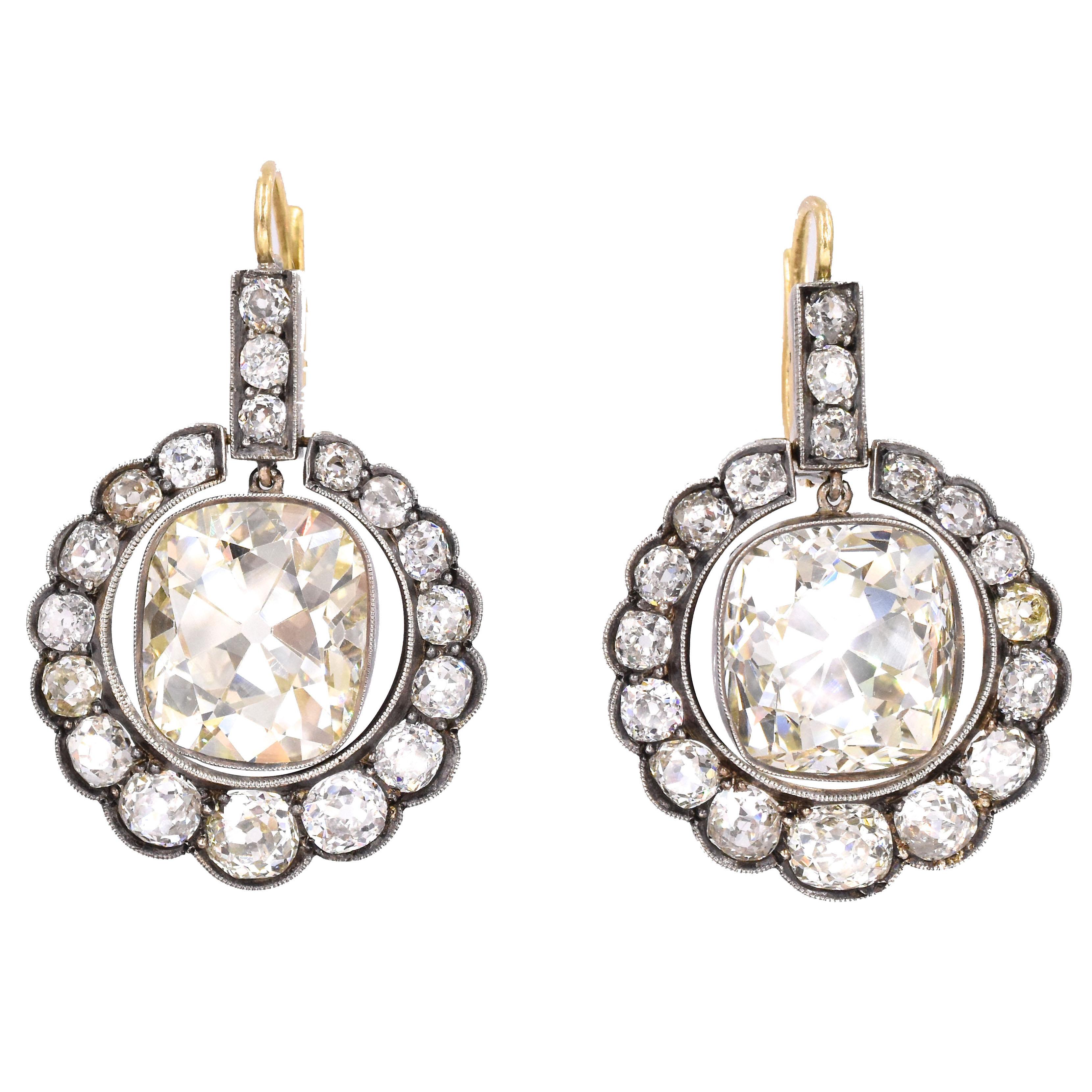 Stunning Victorian drop earrings!
36 gradual old European diamonds set in gold & silver  in a circular shape & filigree workmanship, with estimated total weight of 8 carats
Center diamonds are:
Shape:  Old Cushion Shape 
Weight: 12.88 carat  & 