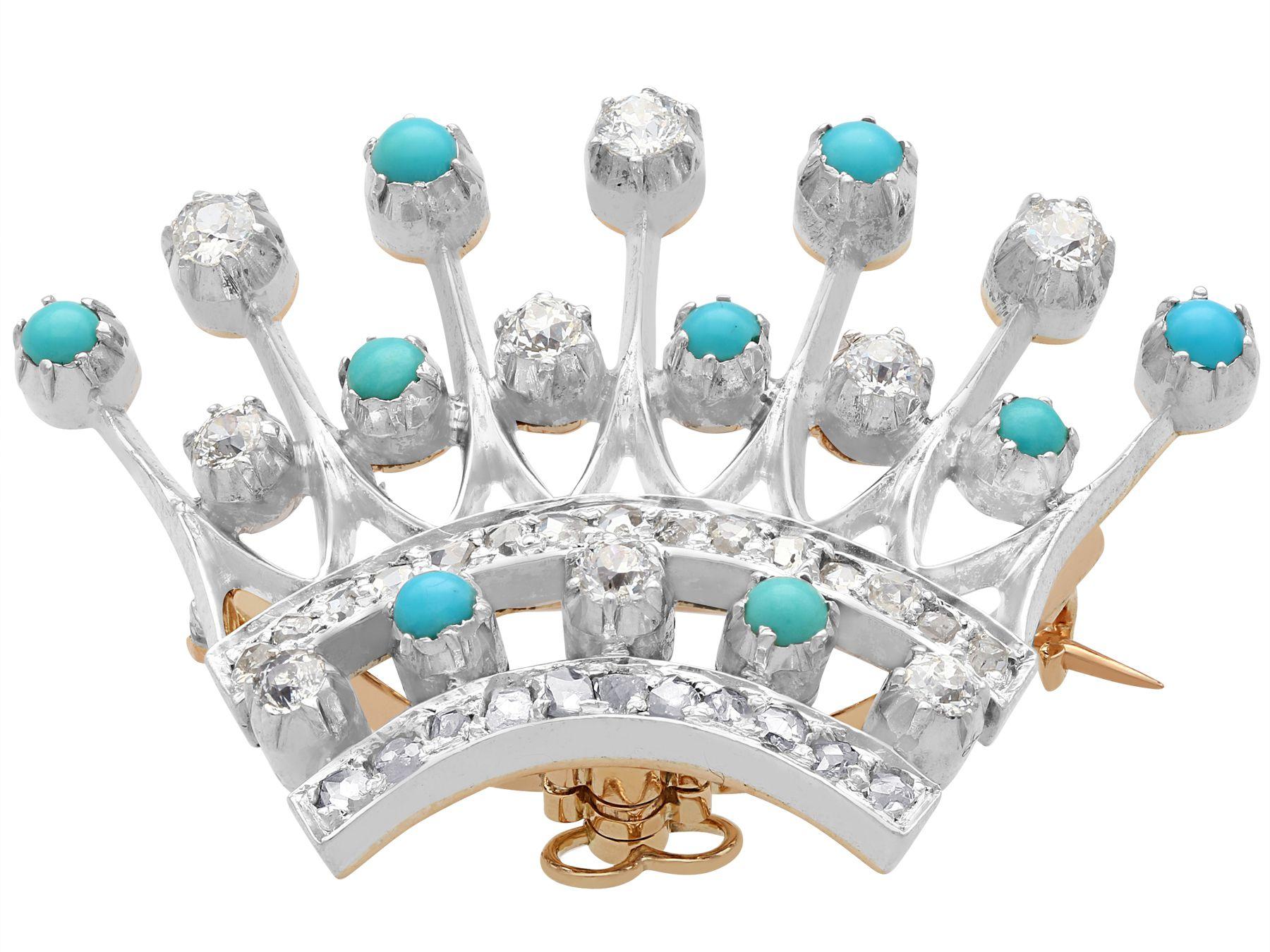 A fine and impressive antique Victorian 2.40 carat diamond and turquoise, 12 karat yellow gold, silver set 'crown' brooch; part of our antique jewelry and estate jewelry collections

This fine and impressive Victorian crown brooch has been crafted