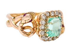Victorian 2.46 Carats Emerald Diamond 18 Karat Rose Gold Snake Halo Ring