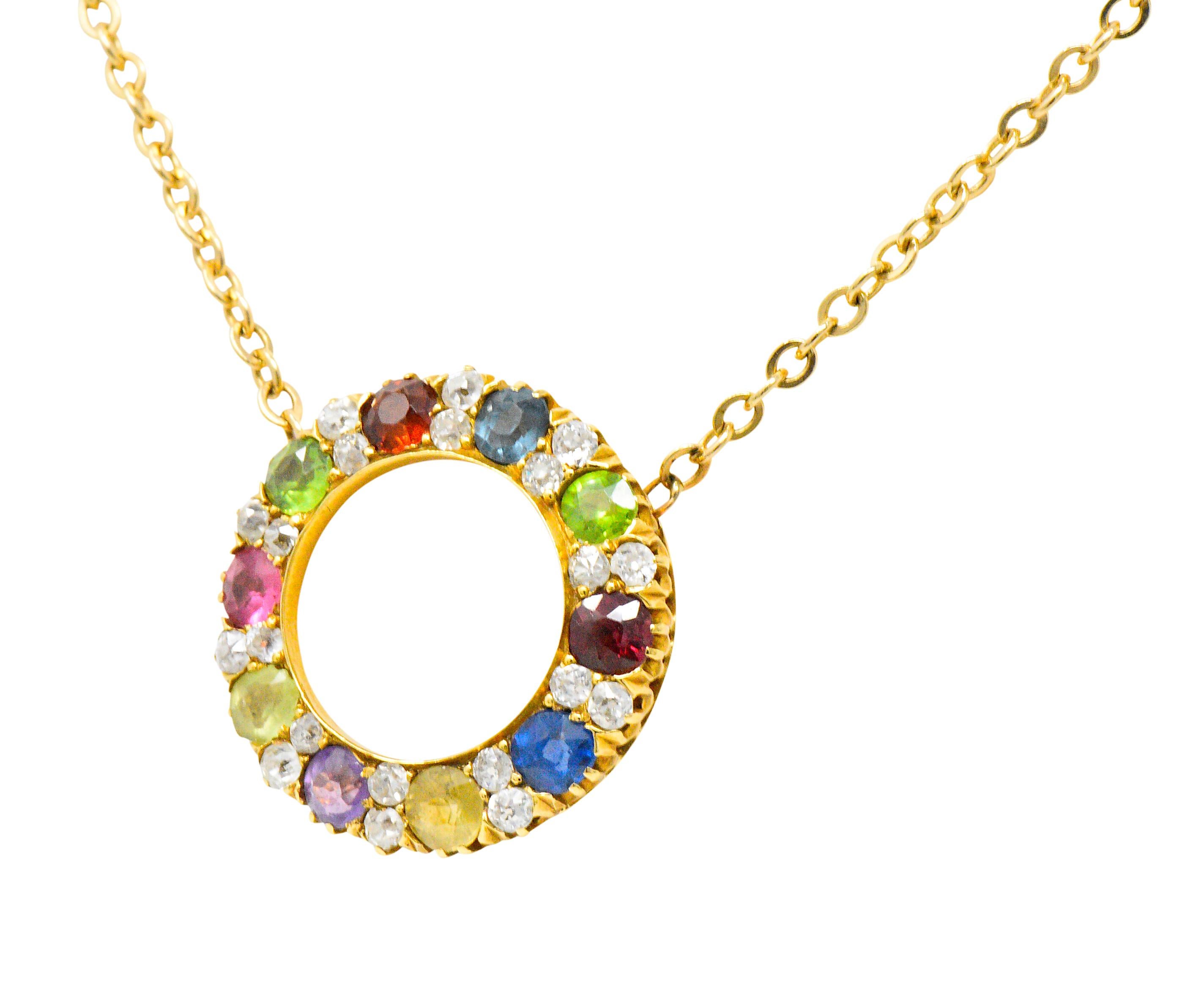 Designed as an open circle set with round cut gemstones, including amethyst, demantoid garnet, tourmaline, sapphire and ruby, weighing approximately 2.00 carats total

Accented with old mine cut diamonds, weighing approximately 0.50 carats total,