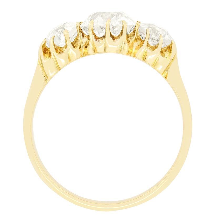 This captivating Victorian trilogy ring showcases a trio of beautiful old cut diamonds. The centre diamond weighs 1.50 carat, with the flanking pair weighing 0.50 carat each. The diamonds range in colour from G to H and in clarity from SI1 to SI2,