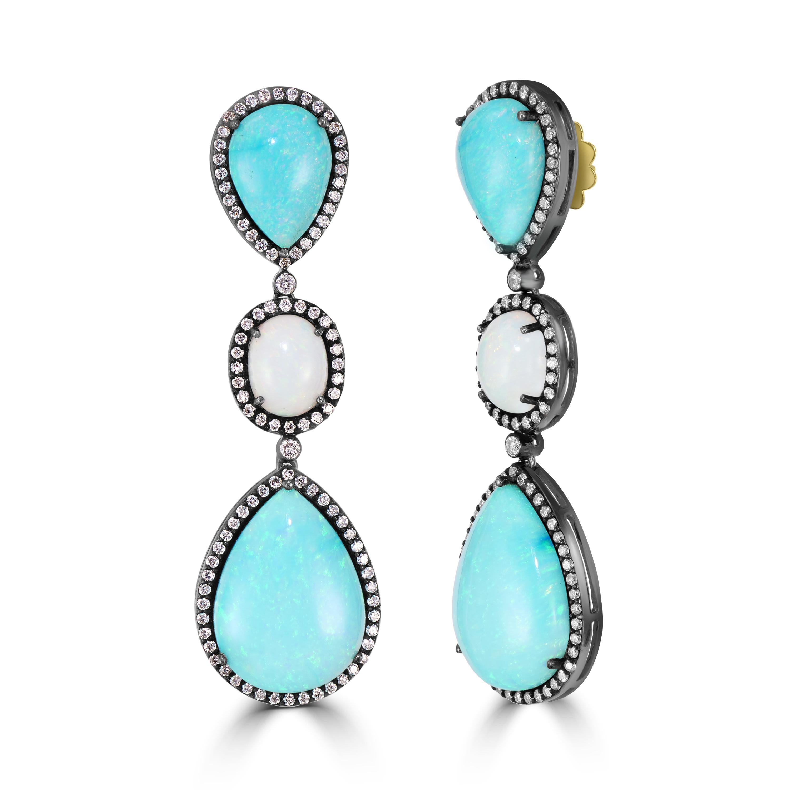 Step into the world of Victorian elegance with the mesmerizing Victorian 25.42 Cttw. Opal and Diamond Dangle Earrings in 18k/925. These earrings boast a cascade of enchanting drops, each intricately designed to showcase the beauty of opals and the