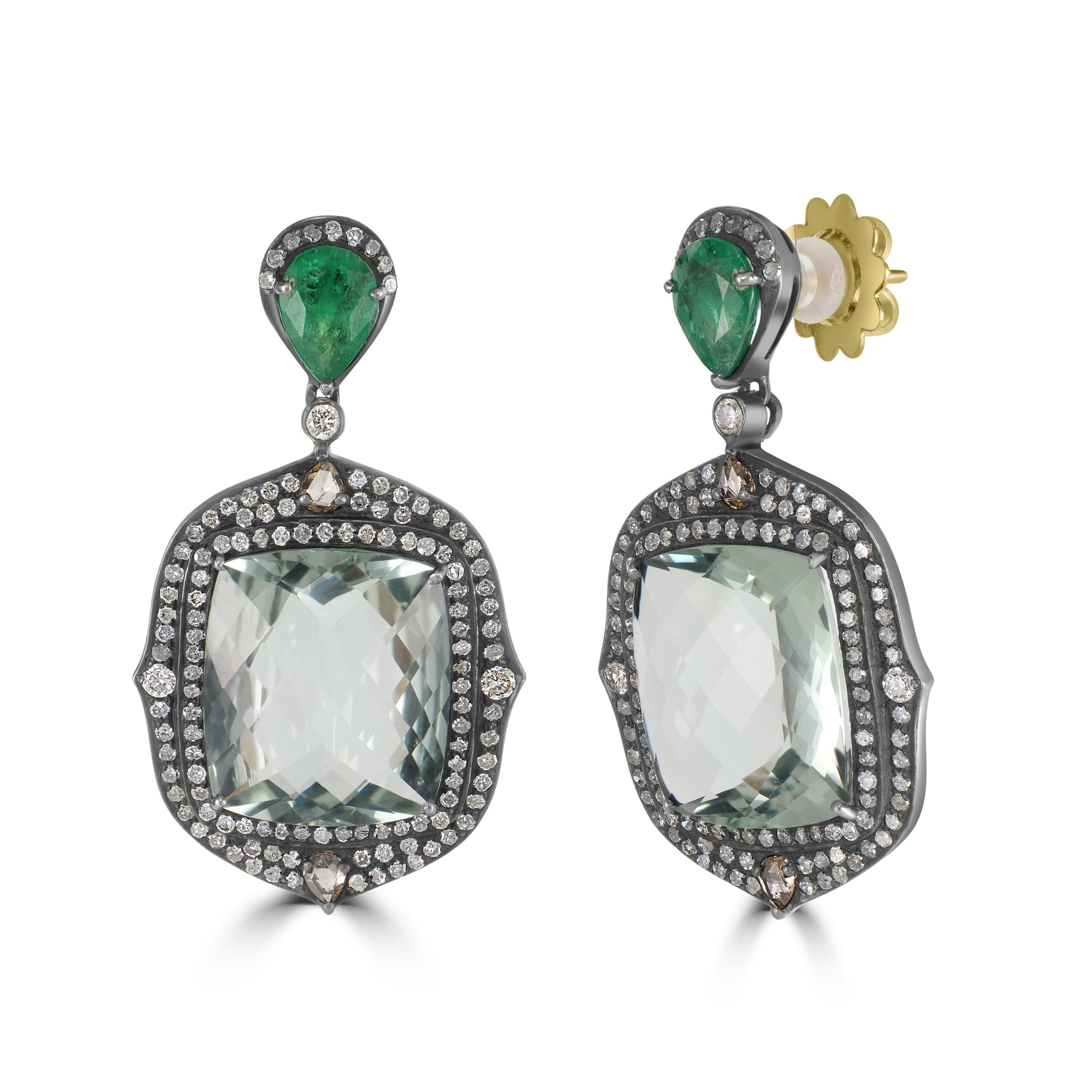 Introducing our stunning Victorian 25.6 Cttw. Green Amethyst, Diamond, and Emerald Dangle Earrings, a masterpiece of elegance and sophistication.

These exquisite dangle earrings feature a captivating frame drop design crafted from sterling silver