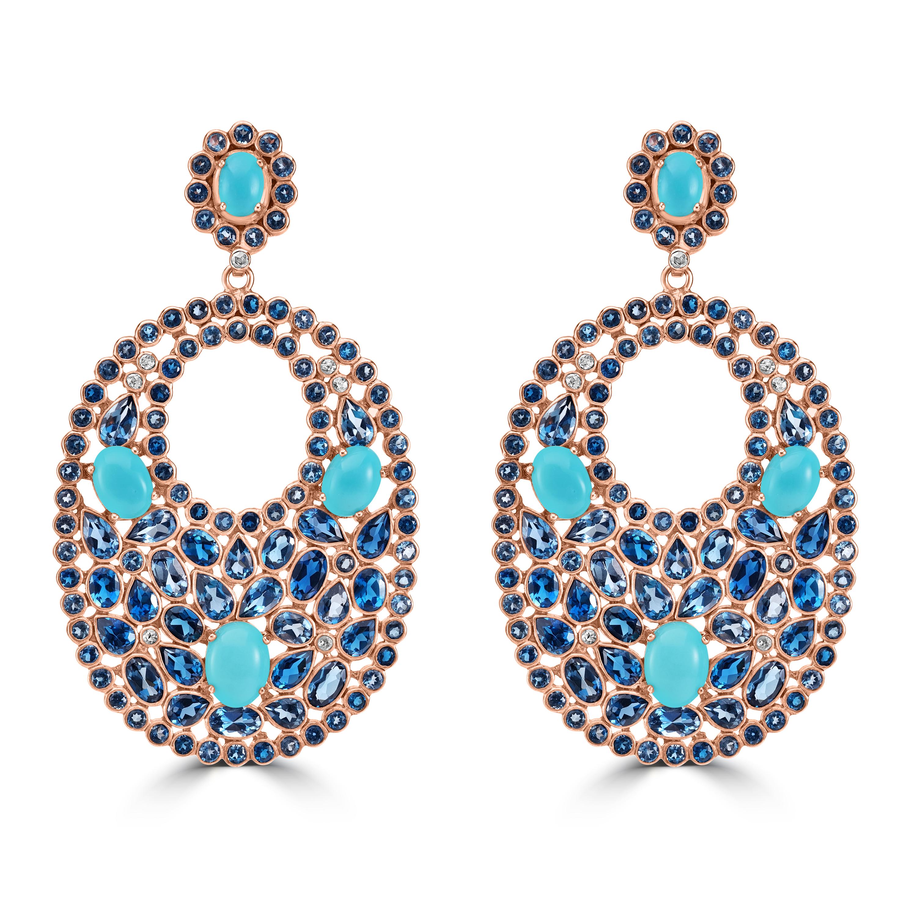 Deck out your earlobes in these majestic Victorian London Blue Topaz, Turquoise, and Diamond Drops by Gemistry. These enchanting earrings feature an intricate circular design that masterfully combines dazzling London Blue Topaz and luminous