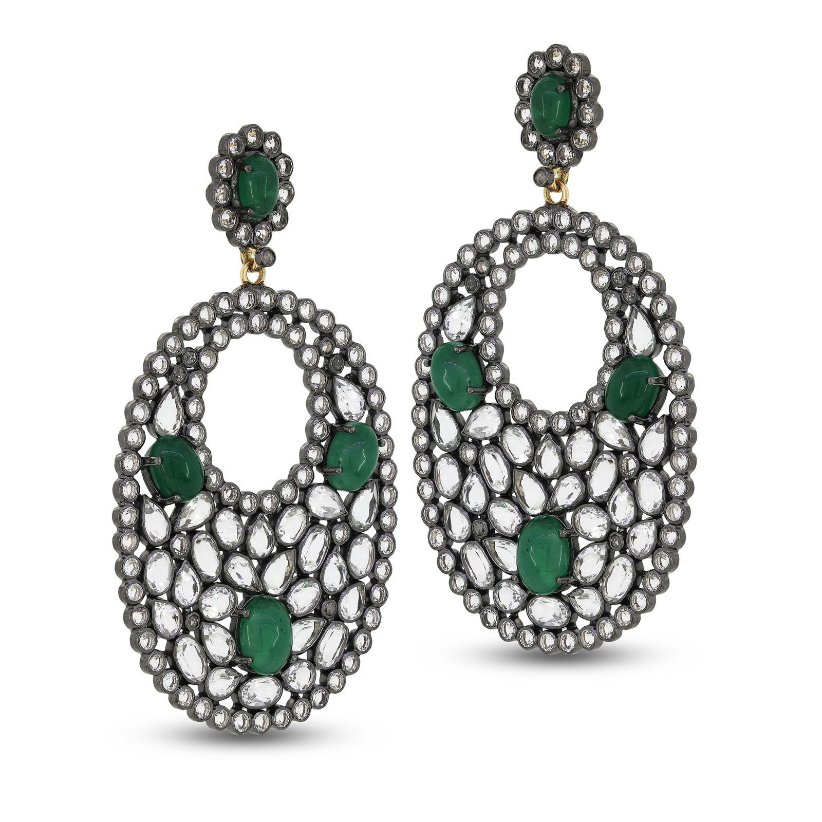 Deck out your earlobes in these majestic Victorian 27.2 Ct. t.w. White Topaz, Emerald and Diamond drops by Gemistry. Featured with an enchanting mix of dazzling white topaz that are intricately arranged in a circular design accentuated by three oval