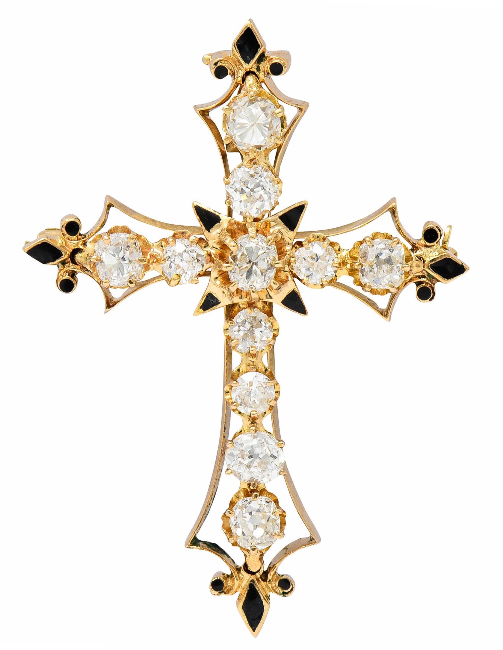 Pendant brooch is designed as a cross belcher set with old European and old mine cut diamonds

Weighing in total approximately 2.85 carats with H to K color and SI clarity - quality is consistent with age

Each terminal is accented by black enamel