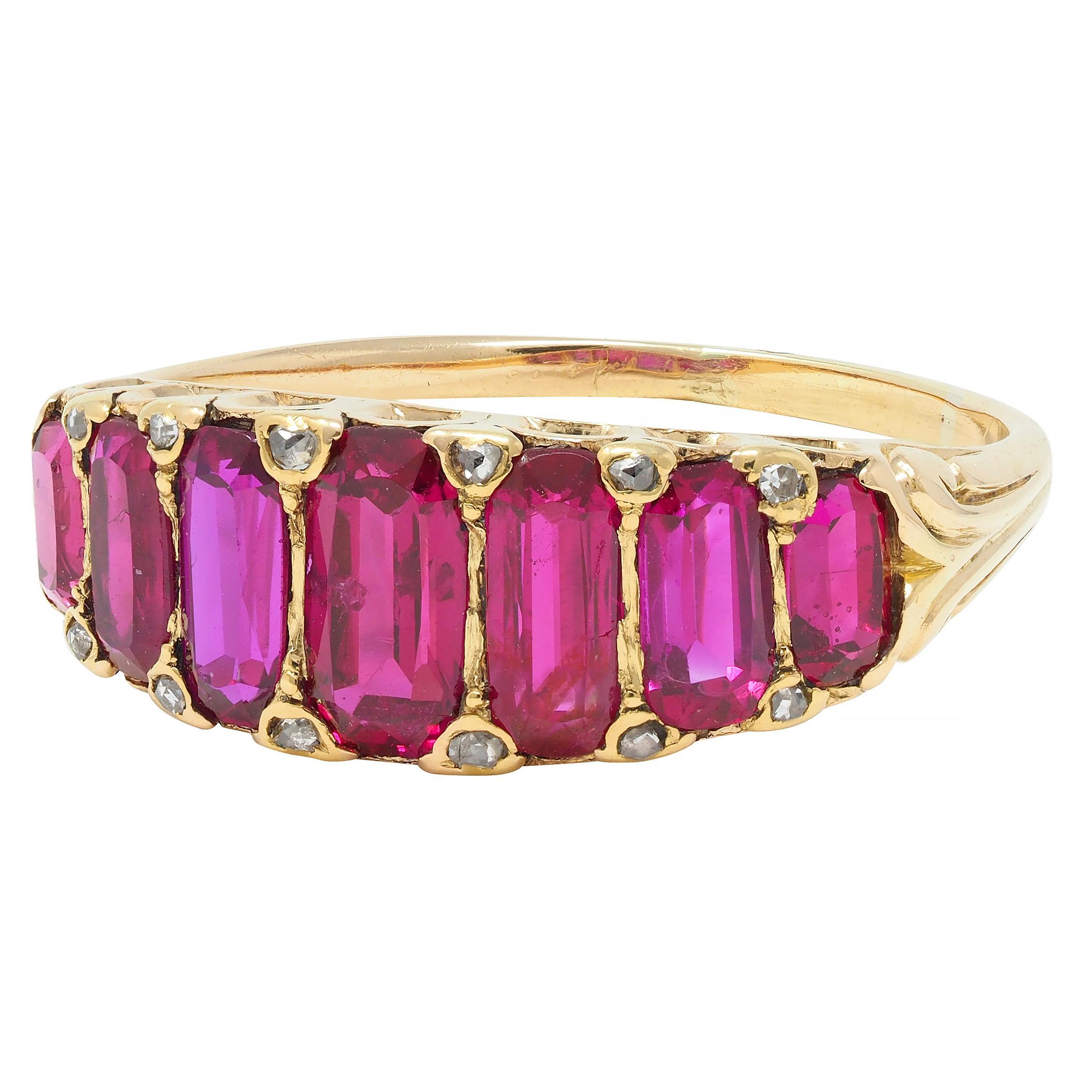 Featuring seven graduated cushion-shaped step cut rubies flush set east to west
Weighing approximately 2.80 carats total - transparent purplish red in color
Natural Burmese in origin with no indications of heat treatment 
Accented by rose cut