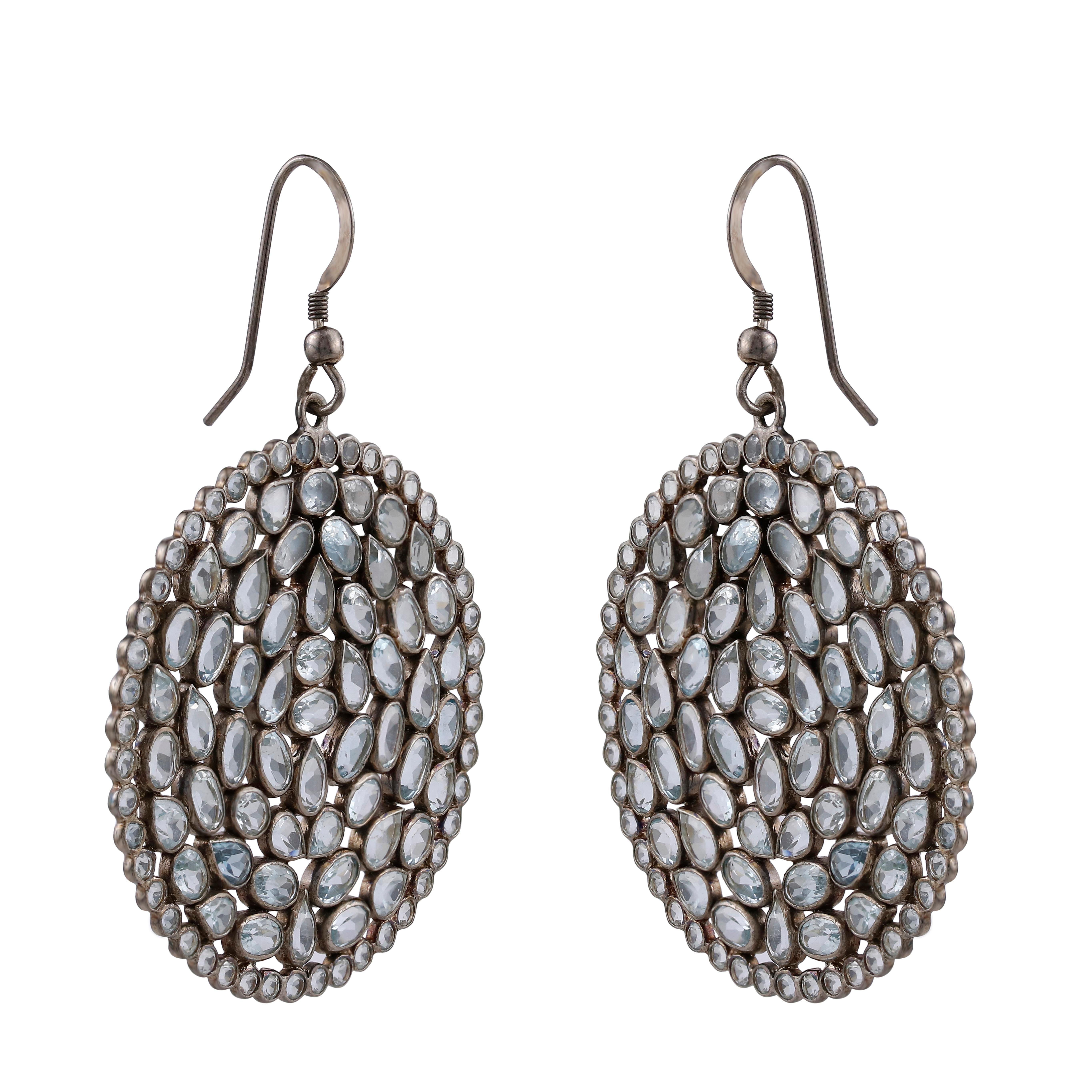 These Victorian handcrafted sterling silver drops include beautiful hues that you will like! The traditional circular design highlights beautiful sky blue topaz accented dangling from lever backs. For a gorgeous coordinated look, pair these with a