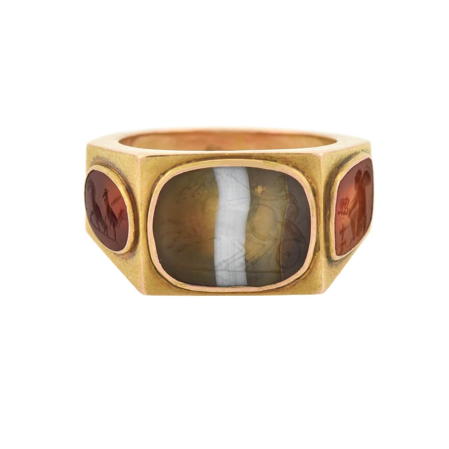 A signet ring can be represented by a smooth or engraved seal, or with an intaglio, which is created by carving into the surface of a stone. Its purpose would have been pressing into sealing wax.

A magnificent and unusual intaglio signet ring from