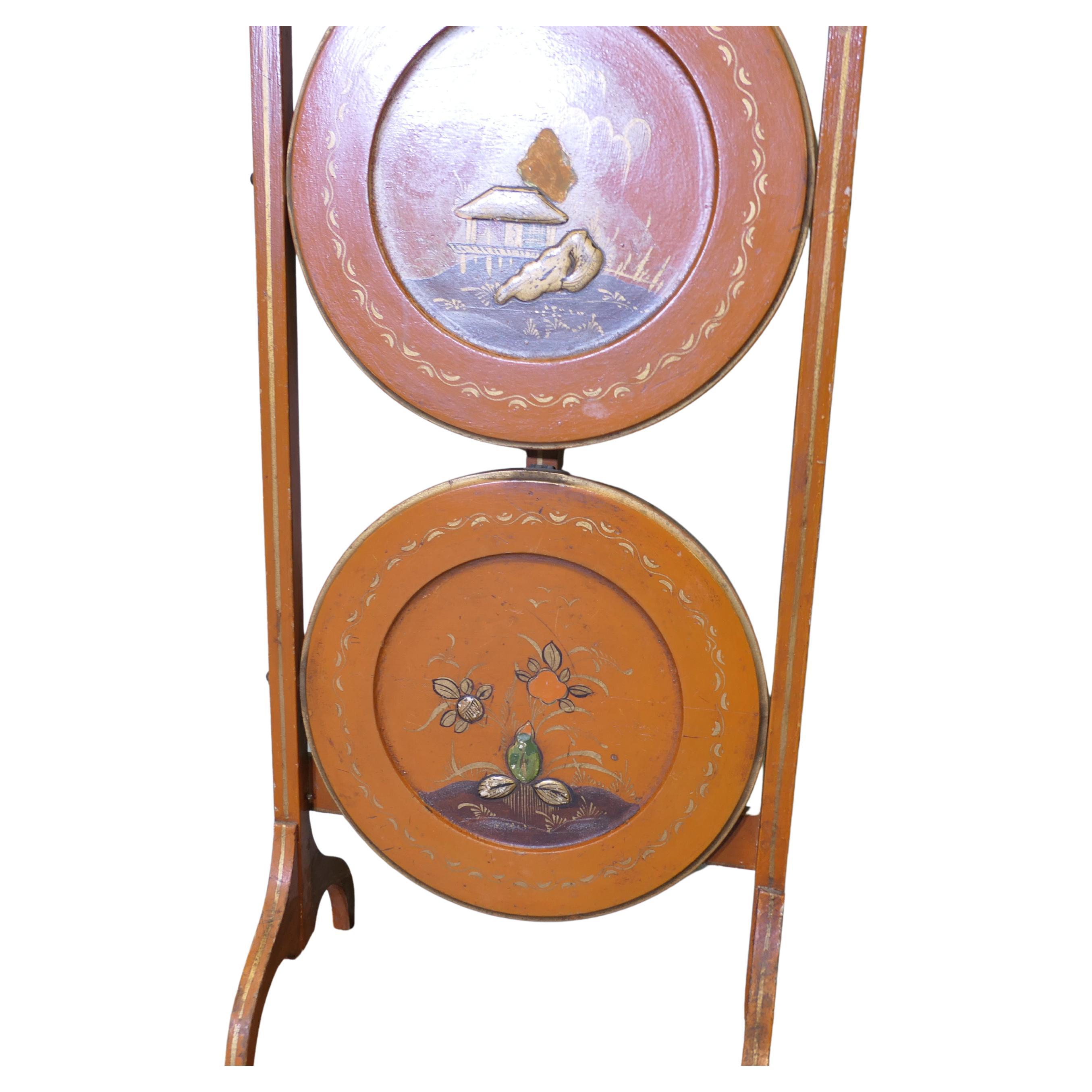 Victorian 3 Tier Oriental Cake Stand

A charming piece, in Burnt Orange Lacquer, decorated with a story
The stand is in good condition, it is 35” tall and the shelves are 11” in diameter
TST154