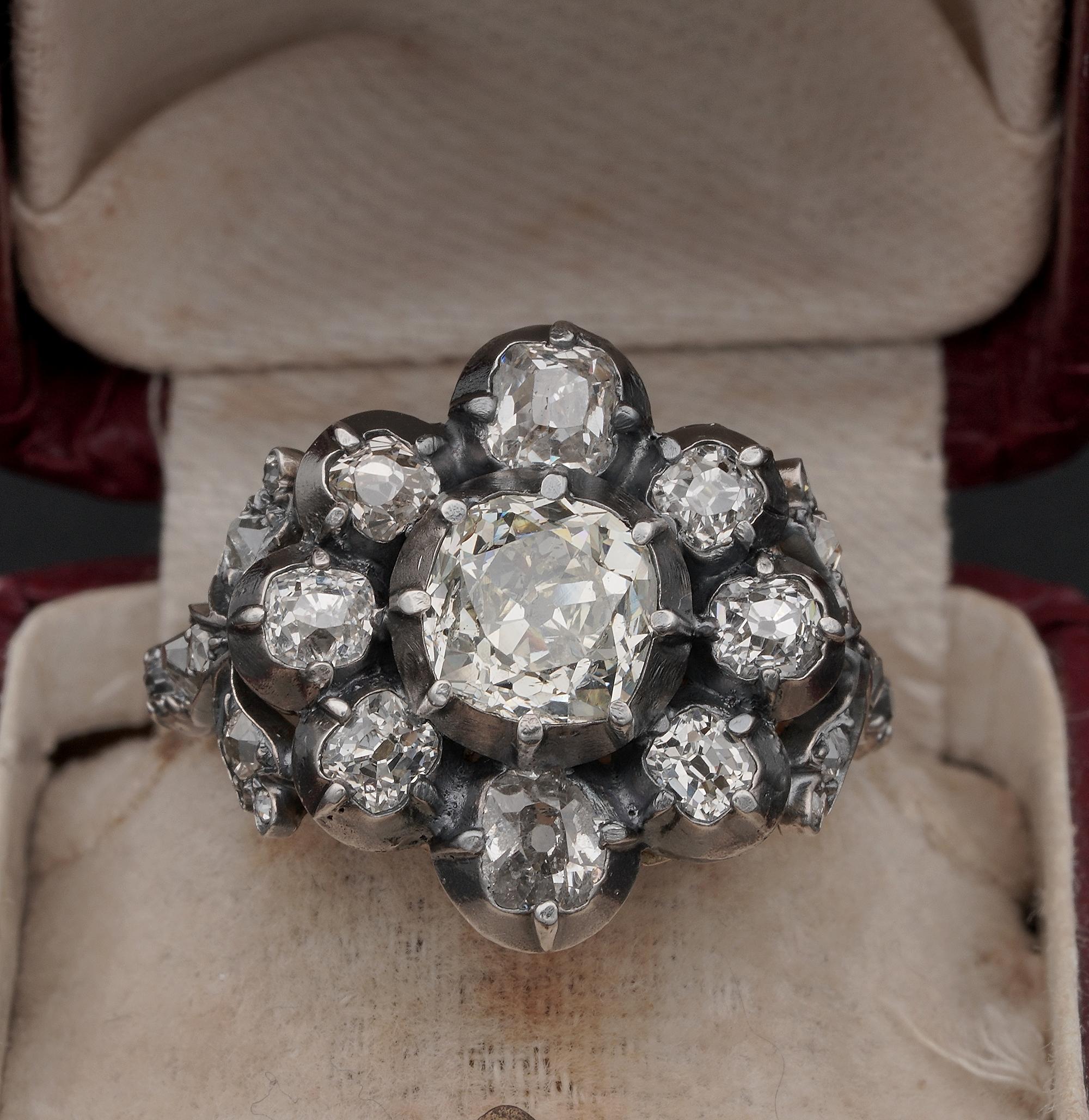 Imposing in presence, large cluster of old mine cut Diamonds with a good weight solitaire at center point and surround of more Diamonds with gorgeous Diamond bow sides
French import marks 1890 ca
Centre Diamond is an old mine cut Diamond of 1.60 Ct