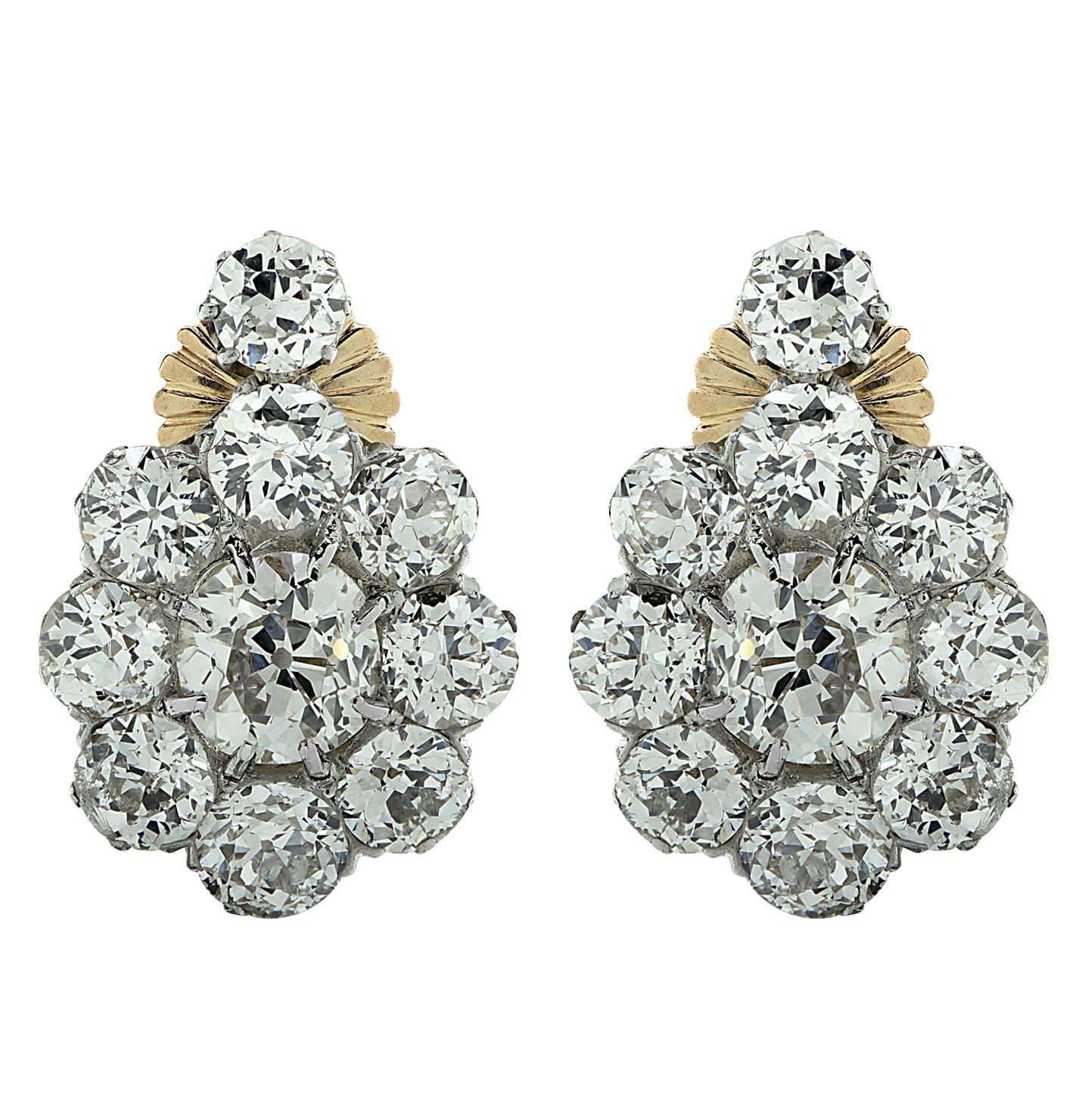 Beautiful Victorian Earrings crafted in 18 karat yellow gold and silver featuring 18 Old Mine Cut diamonds weighing approximately 3.80 carats total, G color, VS-SI clarity and two Old Mine Cut diamonds weighing approximately 1.42 carats total. The