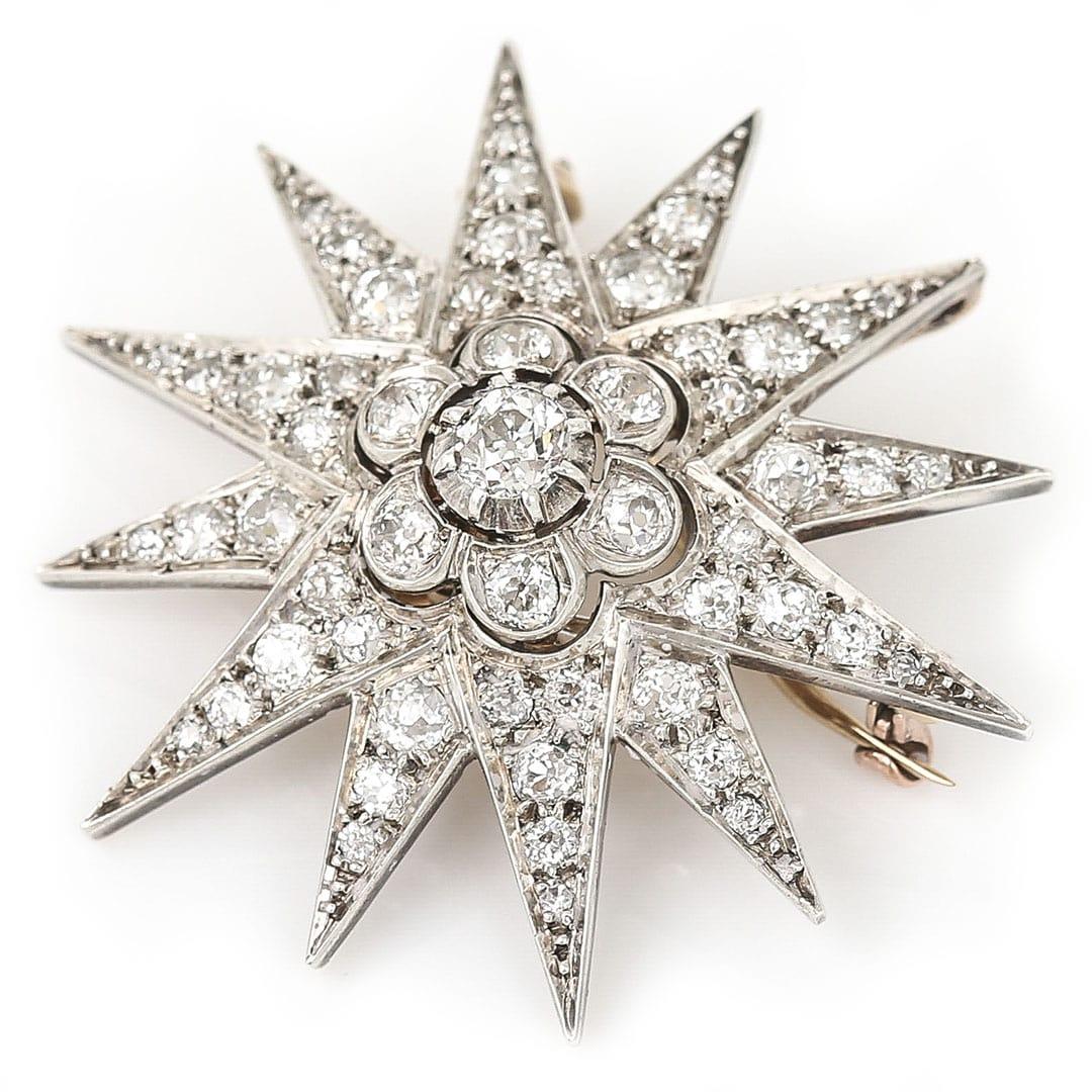 A wonderful Victorian diamond star or otherwise known as a ‘sunburst’ brooch dating from the late 19th century comprising of approx 3ct of old mine cut diamonds. This statement brooch, measuring 42mm diameter is set in 18ct gold and fronted in