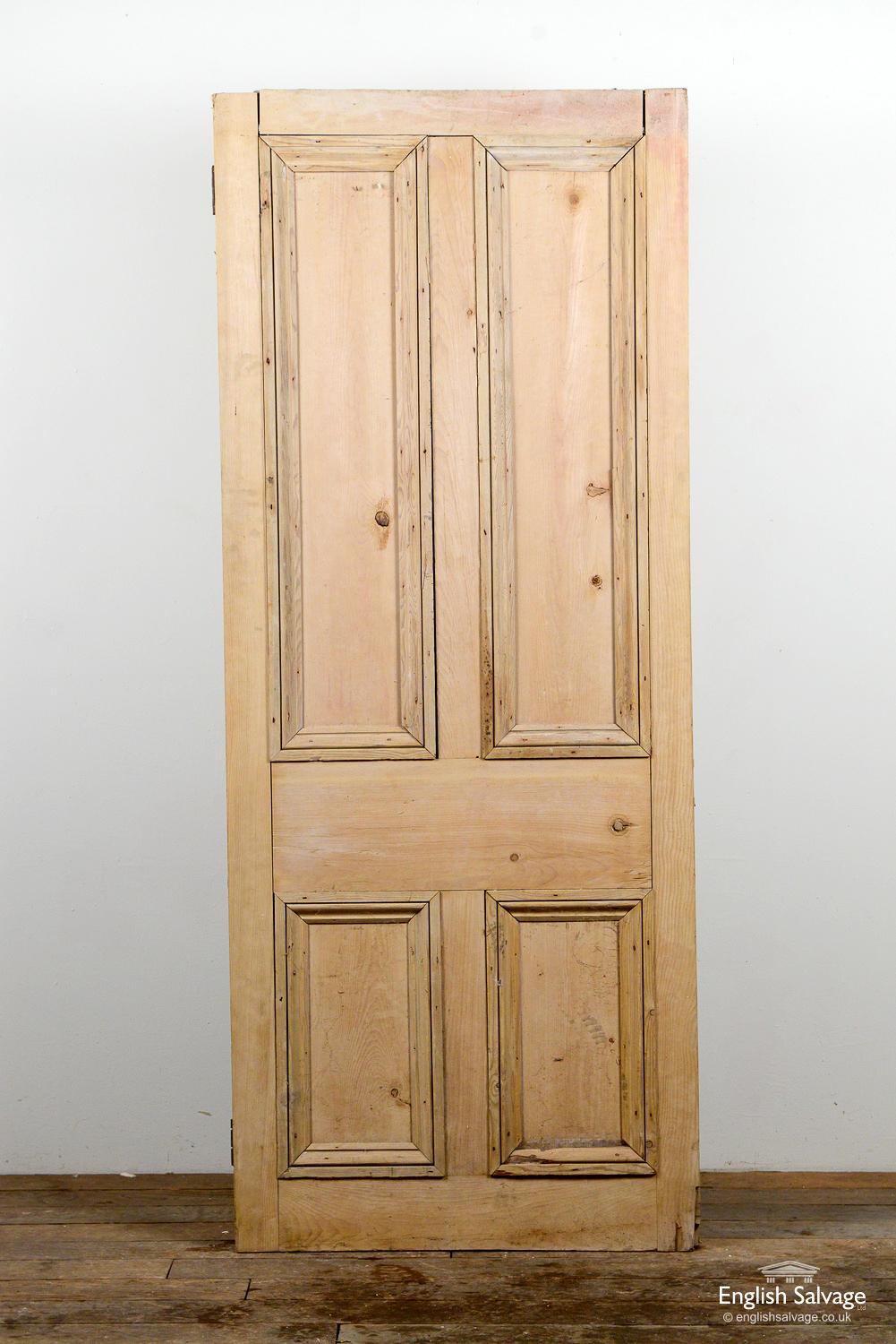 Reclaimed Victorian four beaded panel door, made from pine and the door has been previously stripped of old paint. Slight separation to top rail and chip to bottom latch side of the door and panel beading. Some old holes have been filled.