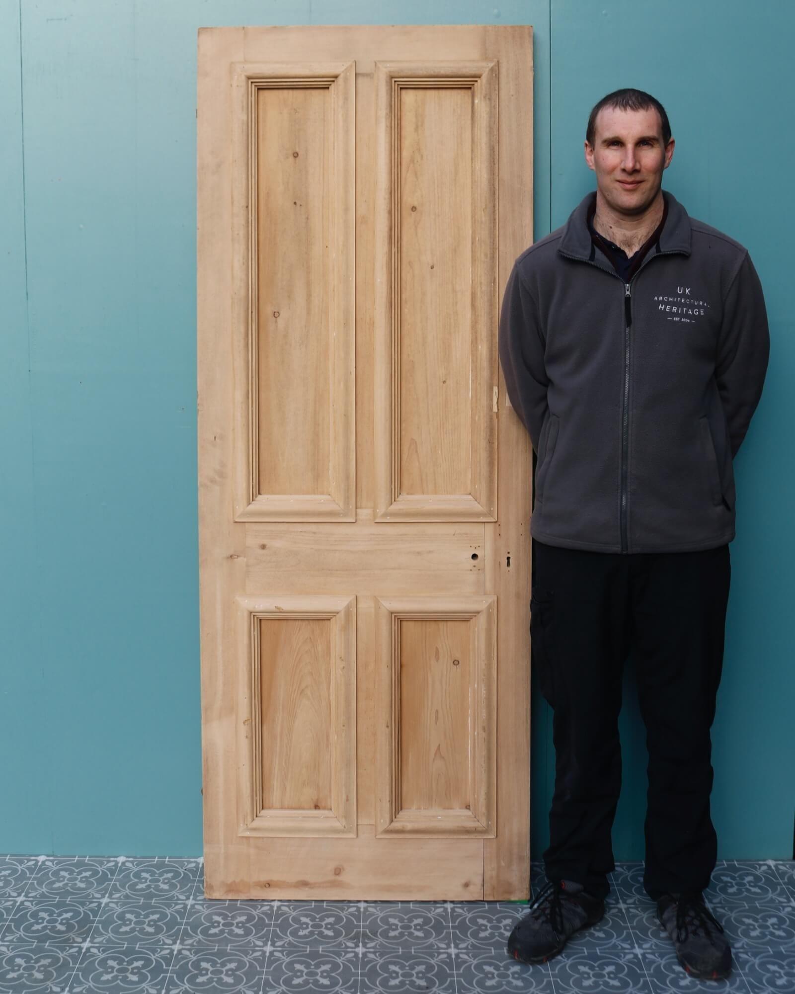 A reclaimed 4-panel Victorian internal or external door dating from the 1890s. Moulding is different on each side. Perfect for an Edwardian townhouse or Victorian cottage. Made in pine, this antique door is stripped and sanded, ready for finishing