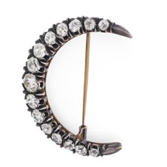 Victorian 4.00 carat old European cut diamond silver on gold crescent brooch