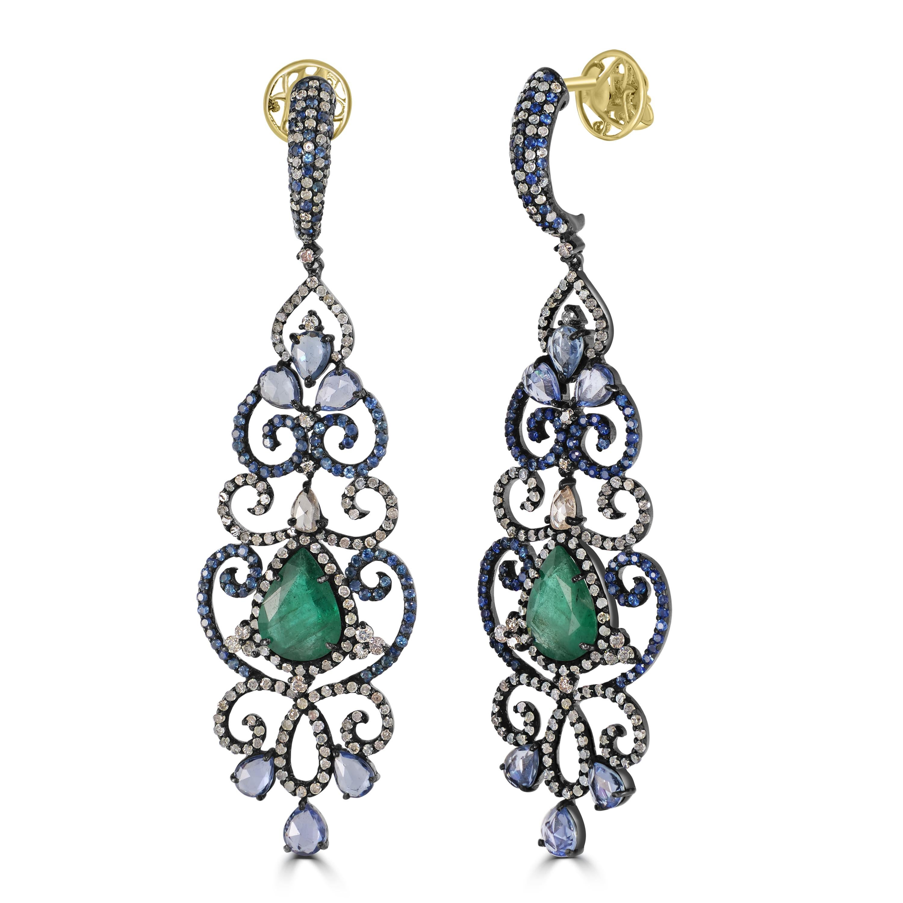 Introducing our exquisite Victorian 4.05 Cttw. Emerald, Blue Sapphire, and Diamond Chandelier Earrings, a true testament to timeless elegance and luxury.

Crafted with meticulous attention to detail, these chandelier earrings feature an intricate