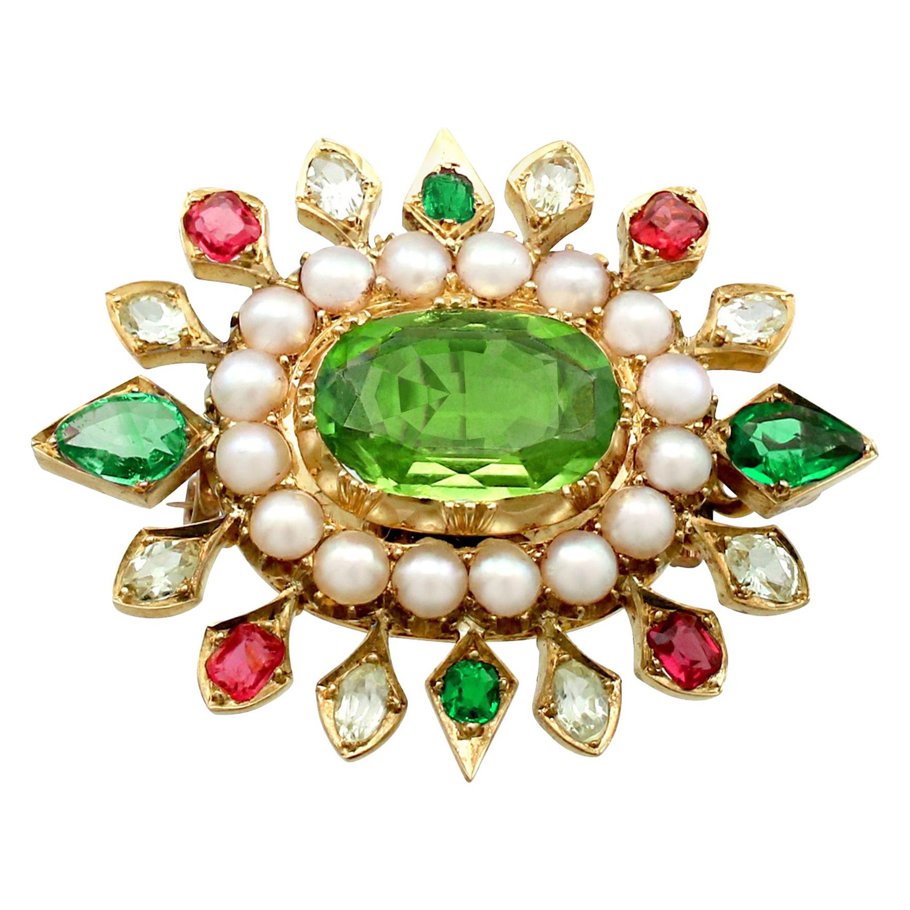Broche victoriano de oro con peridoto de 4,35 quilates y zafiro esmeralda de 2,56 quilates y perlas en semilla