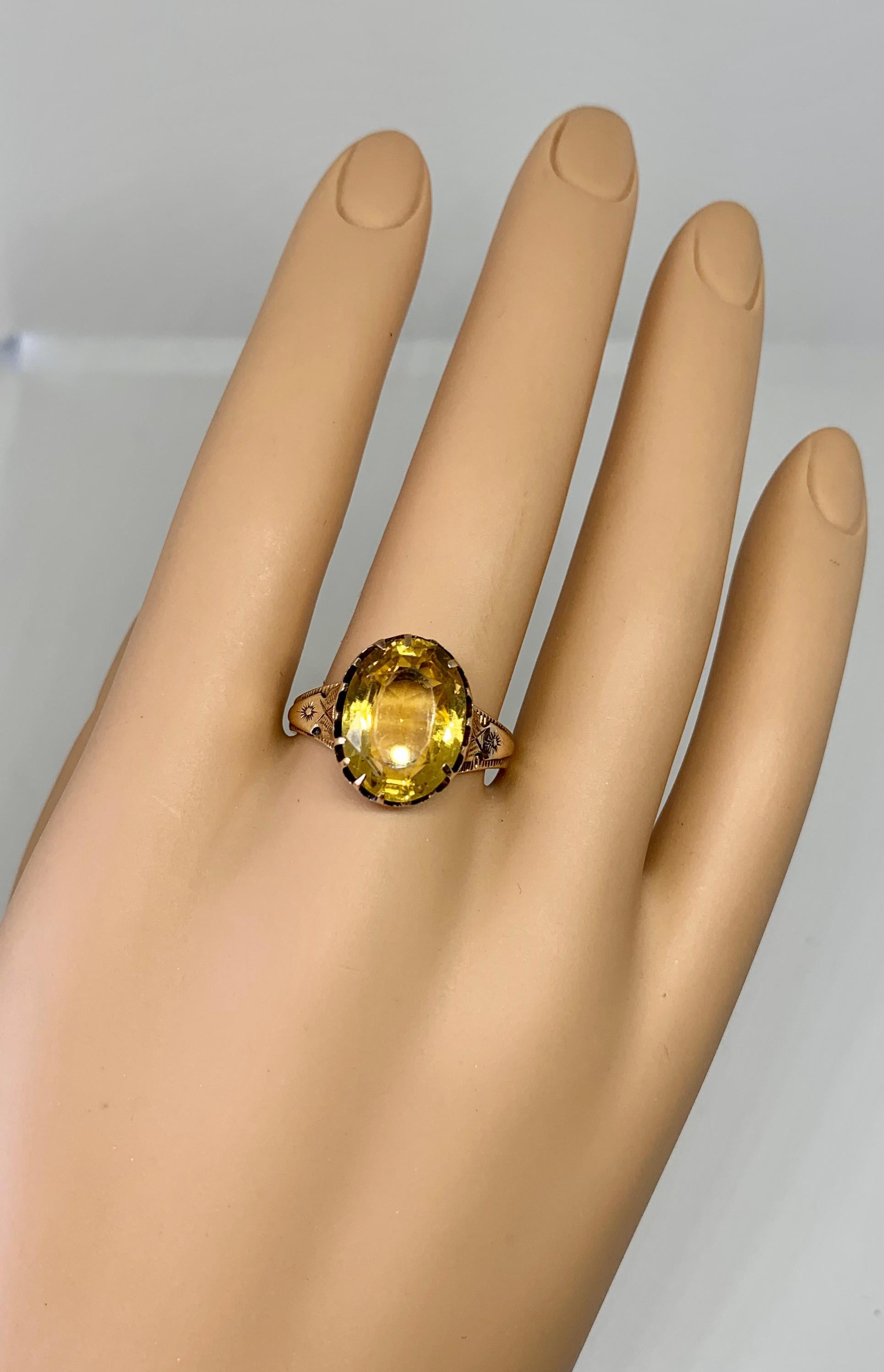 This is an absolutely magnificent antique Victorian Belle Epoque 5.25 Carat Citrine Ring in a 10 Karat Gold setting of great beauty.   The magnificent statement ring is one of the most beautiful early antique citrine rings we have seen.  The oval