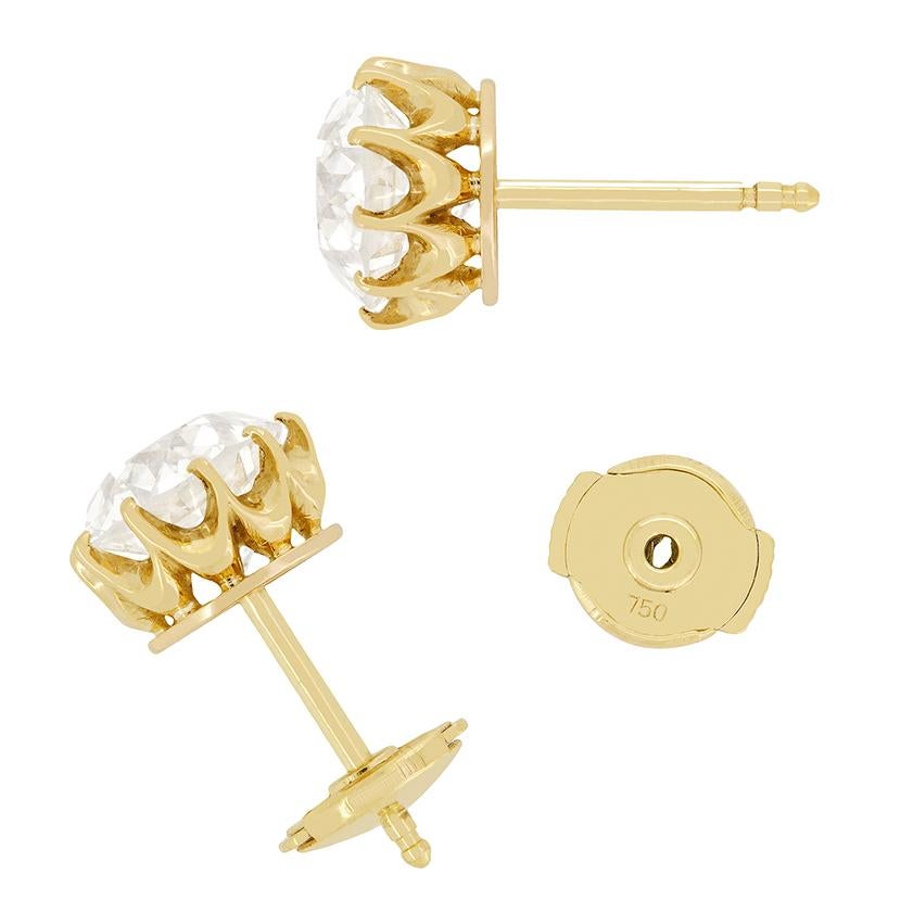 This magnificent set of diamond stud earrings are truly awe inspiring. Dating back to the Victorian period, the pair of beautiful 2.50 carat old cut diamonds are claw set in contrasting 18 carat yellow gold and setting these earrings apart as